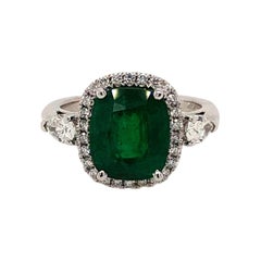 3-Stone Ring with Emerald and Diamond Pear Shapes