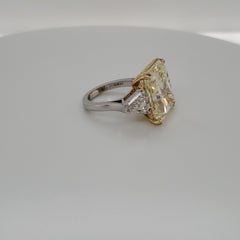 3-Stone Ring with GIA Certified 16.95 Carat Fancy Yellow SI1 Center Diamond