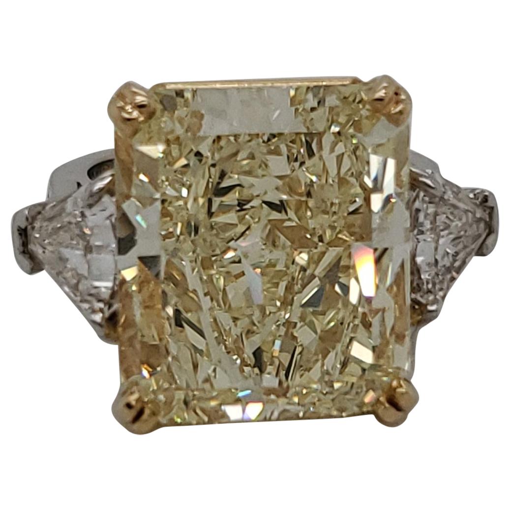 3-Stone Ring with GIA Certified 16.95 Carat Fancy Yellow SI1 Center Diamond