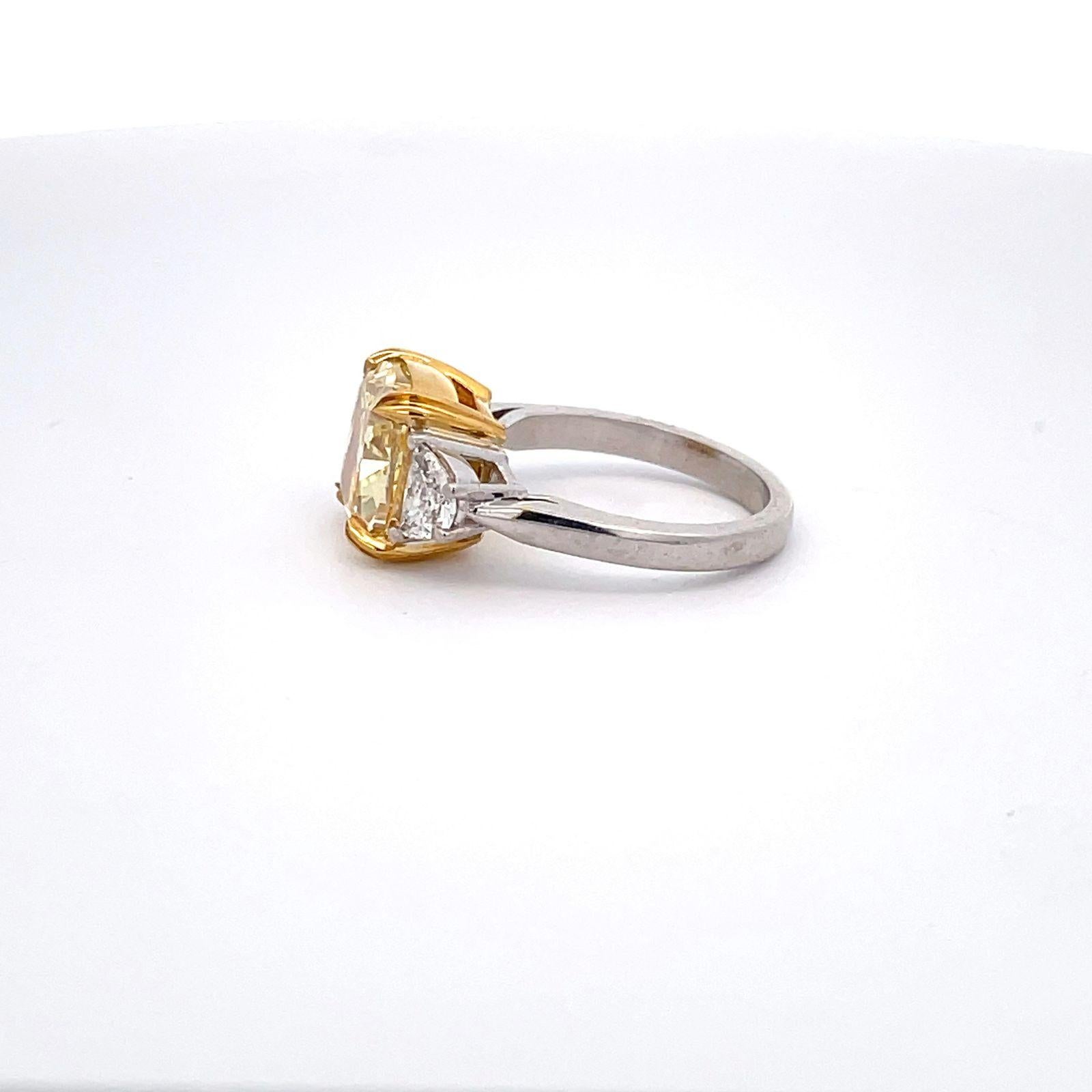 Cushion Cut 3-stone Ring with GIA FIY/VS1 Cushion Center and Half Moon Sides. D5.70ct.t.w. For Sale