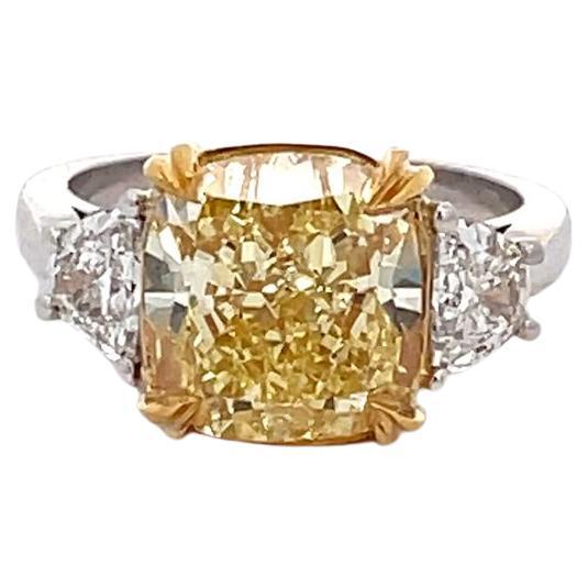3-stone Ring with GIA FIY/VS1 Cushion Center and Half Moon Sides. D5.70ct.t.w. For Sale