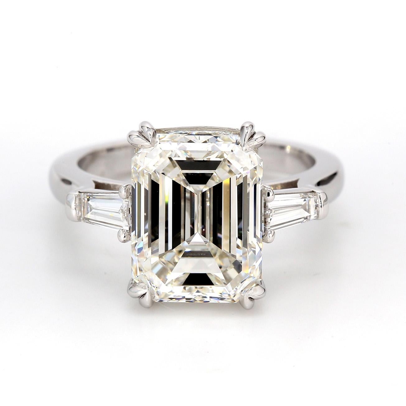 Emerald Cut 3-stone Ring with GIA H/VS2 Emerald Center and Baguette Sides. D6.50ct.t.w. For Sale