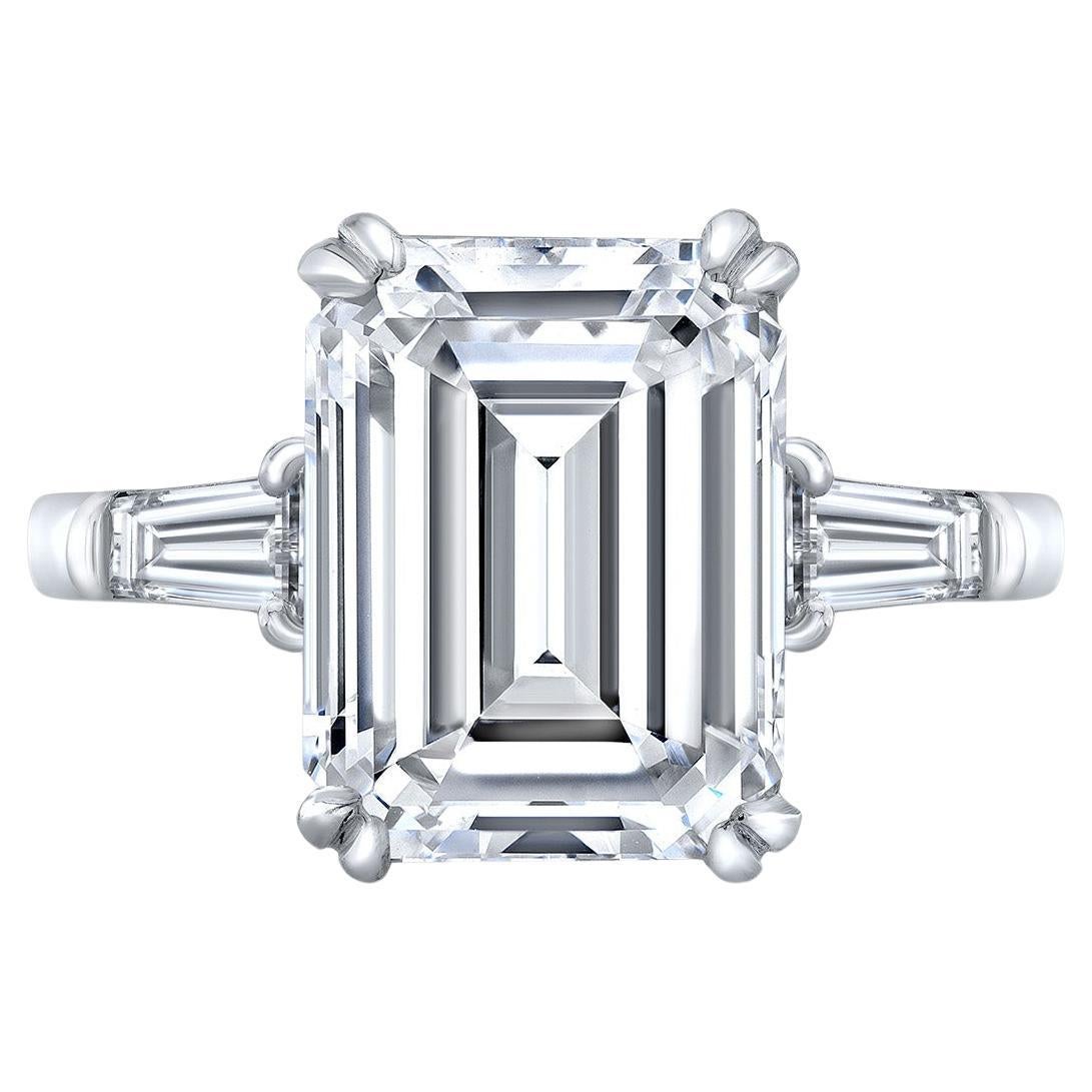 3-stone Ring with GIA H/VS2 Emerald Center and Baguette Sides. D6.50ct.t.w. For Sale
