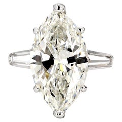 3-stone Ring with GIA I/SI2 Marquise Diamond Center and Baguette Sides. D5.49ct.
