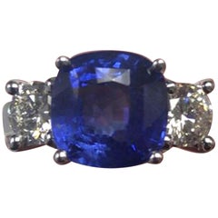 3 Stone 4.31 Cushion Sapphire and White Diamond  Platinum Ring, GIA Certified  