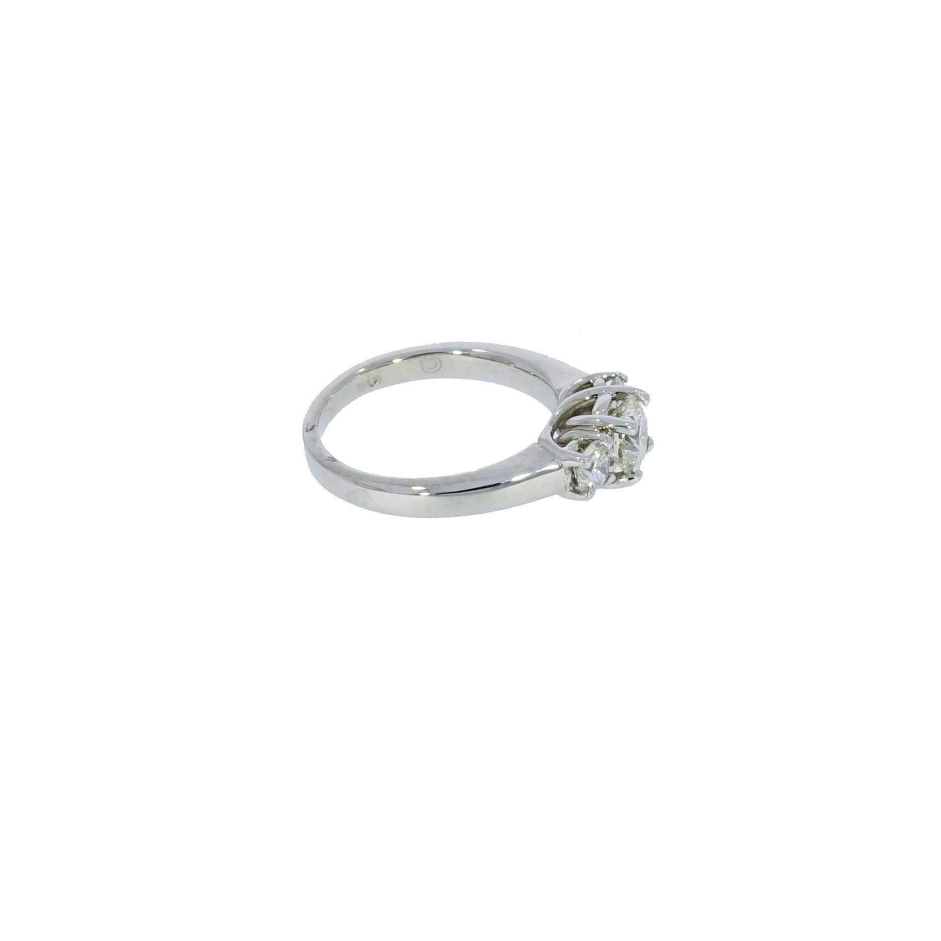 Three Stone Engagement Rings are one the most popular styles, giving you endless combinations possible. 
Crafted in 14k White Gold, this ring features a 0.75 carat, G/H color, SI1 clarity with 0.23 carat at each side.
Finger Size: 6.5
