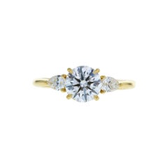 3-Stone Round Diamond Engagement Ring with Pear Shaped Side Stones Yellow Gold