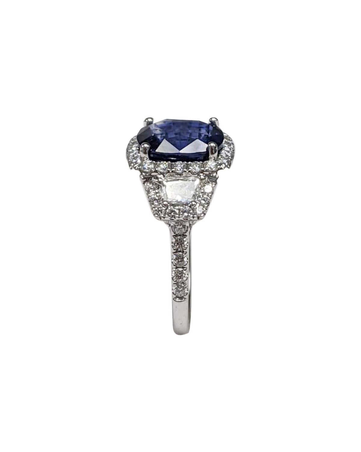 GIA Certified Sapphire White Diamond Ring, 18k White Gold
Hand made Ring with top craftsmanship , 
Set with a Very fine AAAA Gem quality Genuine Saph. (10x9 mm)  4.79 crts
Diamonds: G color and VS clarity. (48 Rd. and 2 Trapezoids)