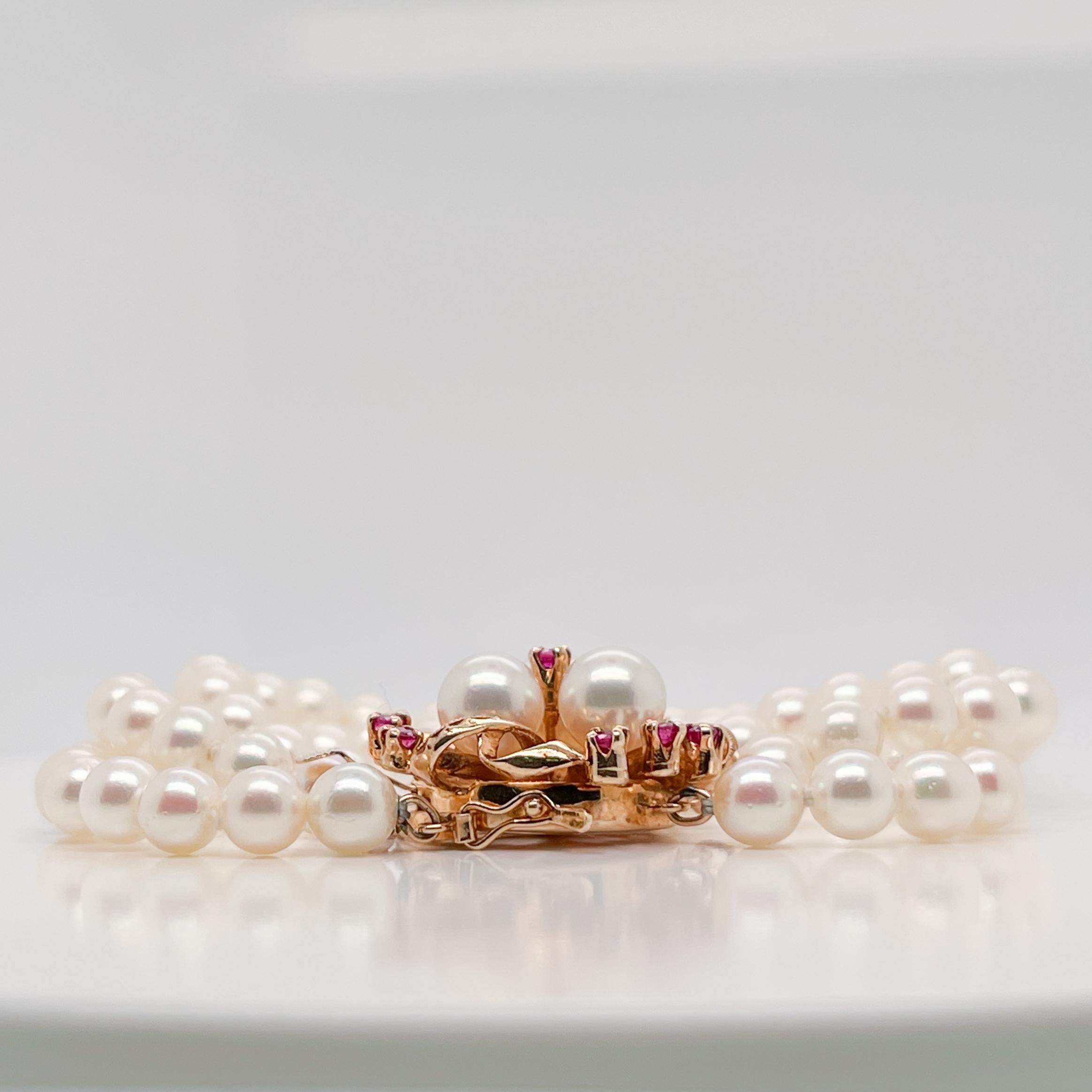 Edwardian 3-Strand Tasaki Akoya Pearl Bracelet with 14 Karat Gold & Ruby Clasp