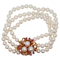 3-Strand Tasaki Akoya Pearl Bracelet with 14 Karat Gold & Ruby Clasp