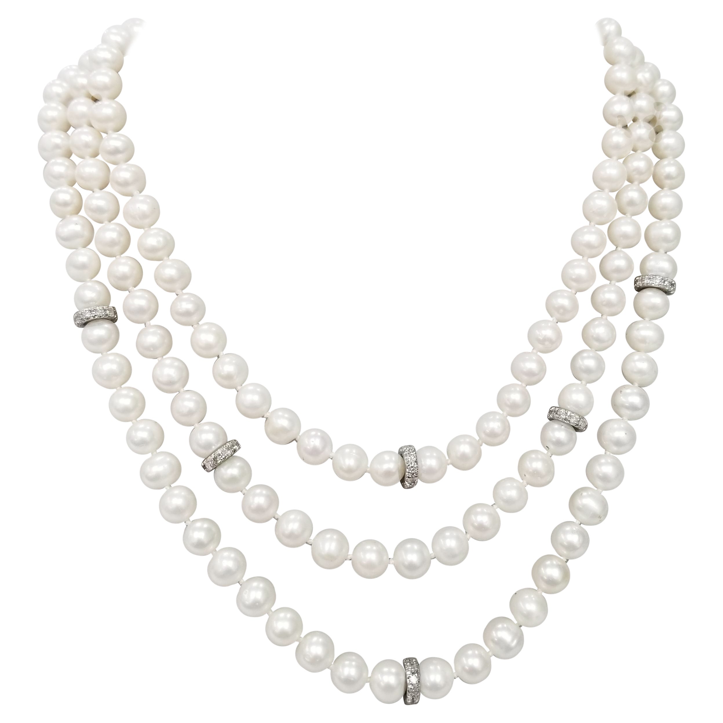 3 fili di perle coltivate d'acqua dolce con diamante 14k da 2,16 carati. Rondles