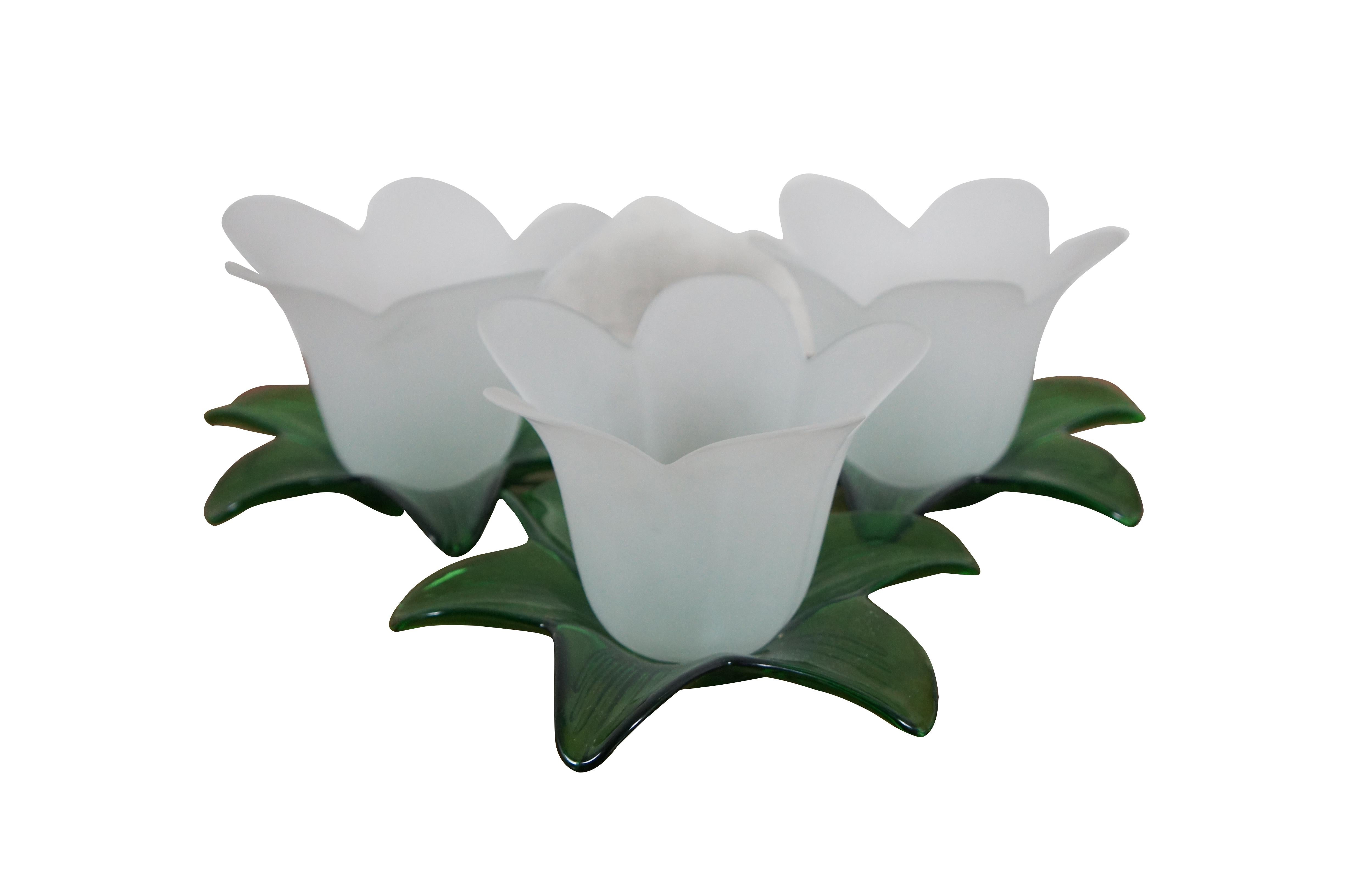 Set of three late 20th century Studio Nova votive / tea light tulip or daffodil shaped floral candle holders. Green leaf shaped bases with white frosted glass petal tops. 

Dimesions:
7.75