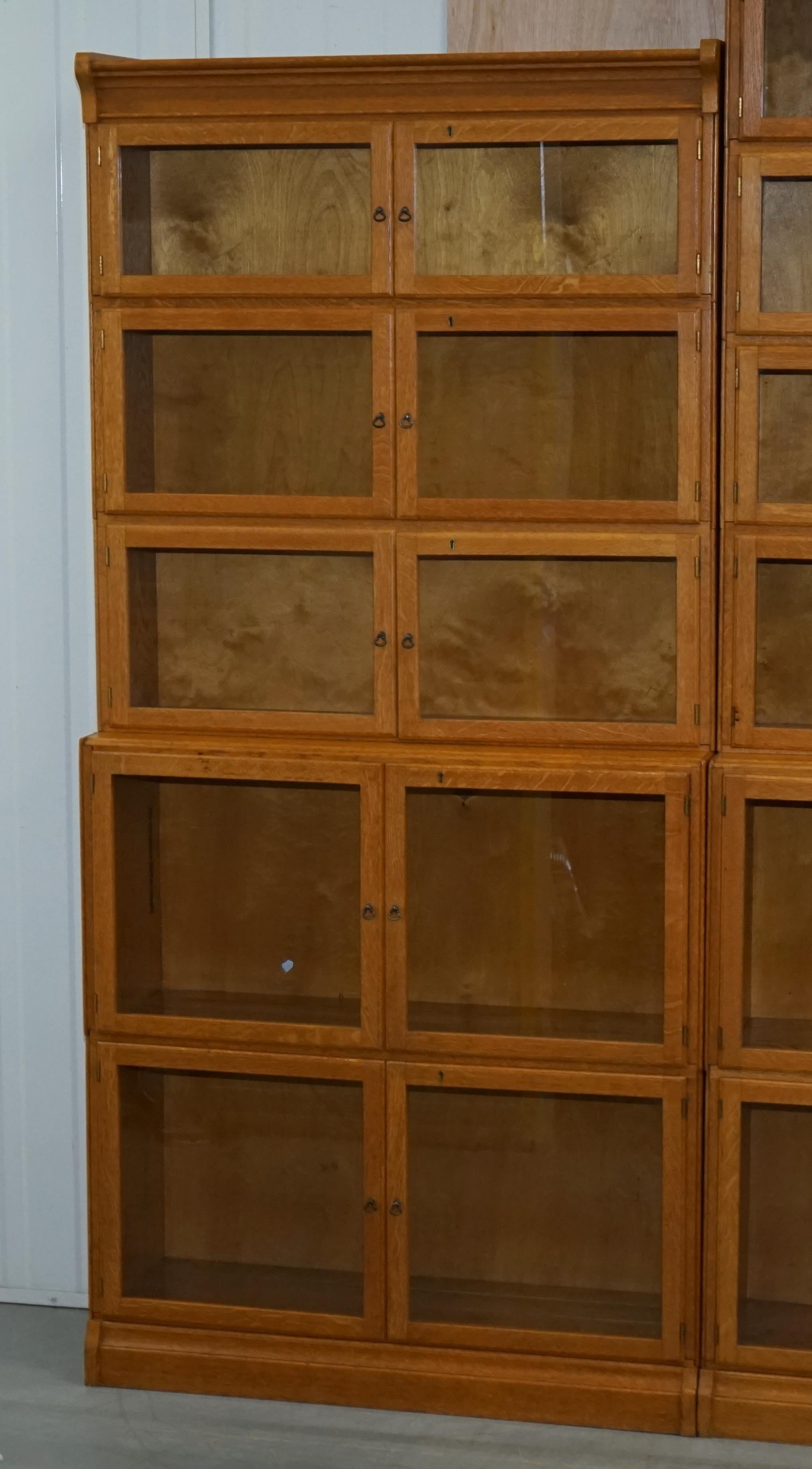 We are delighted to offer for sale this very rare circa 1900 suite of three Minty Oxford Golden Oak stacking modular Library Legal bookcases 

This is an exceptionally rare find, firstly if you are not familiar with stacking bookcases each section