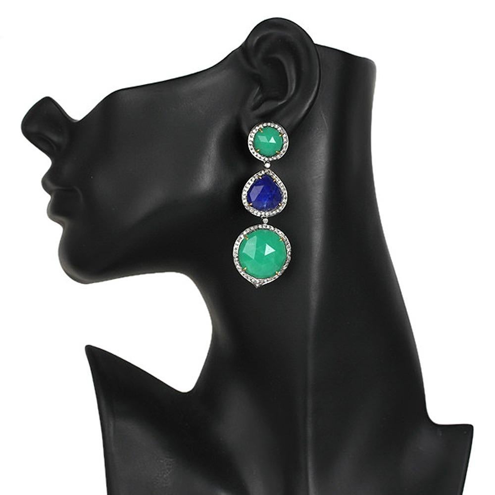 18k:2.03g,
Diamond:2.08ct,
Silver:8.96gm,
Crysophase:43.60ct,
Lapis:17.95ct
Size: 68X24MM