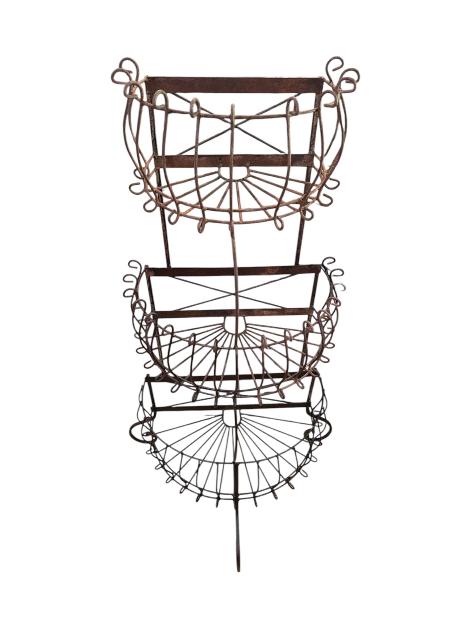 Showcase your favorite plants in style with this 3-Tier Wrought Iron Plant Stand, a perfect combination of durability, elegance, and functionality. Designed to enhance both indoor and outdoor spaces, this stand offers a sturdy and decorative