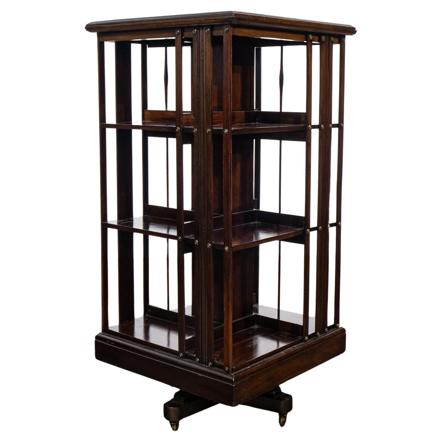 3 Tiered Revolving Mahogany Bookcase on Castors For Sale