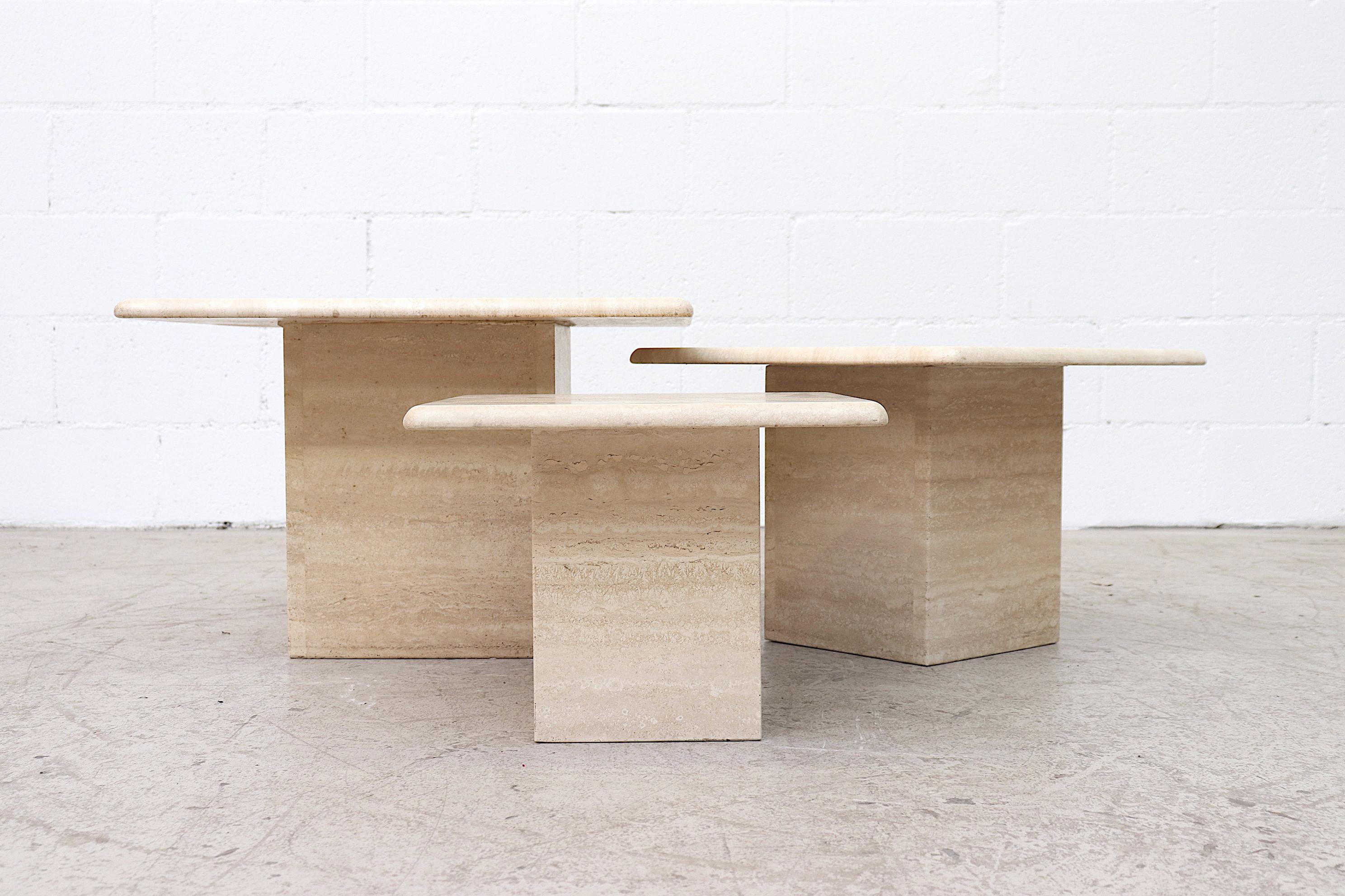 Set of 3 Travertine coffee or side tables with matching travertine base. In original condition with minimal wear or chipping.
Measures: Large 23.75 x 23.75 x 16
Medium 20 x 20 x 14
Small 16 x 16 x 12.