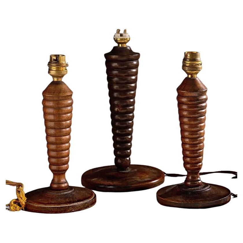 3 turned wood lamps circa 1940/1950 in the style of Charles Dudouyt For Sale
