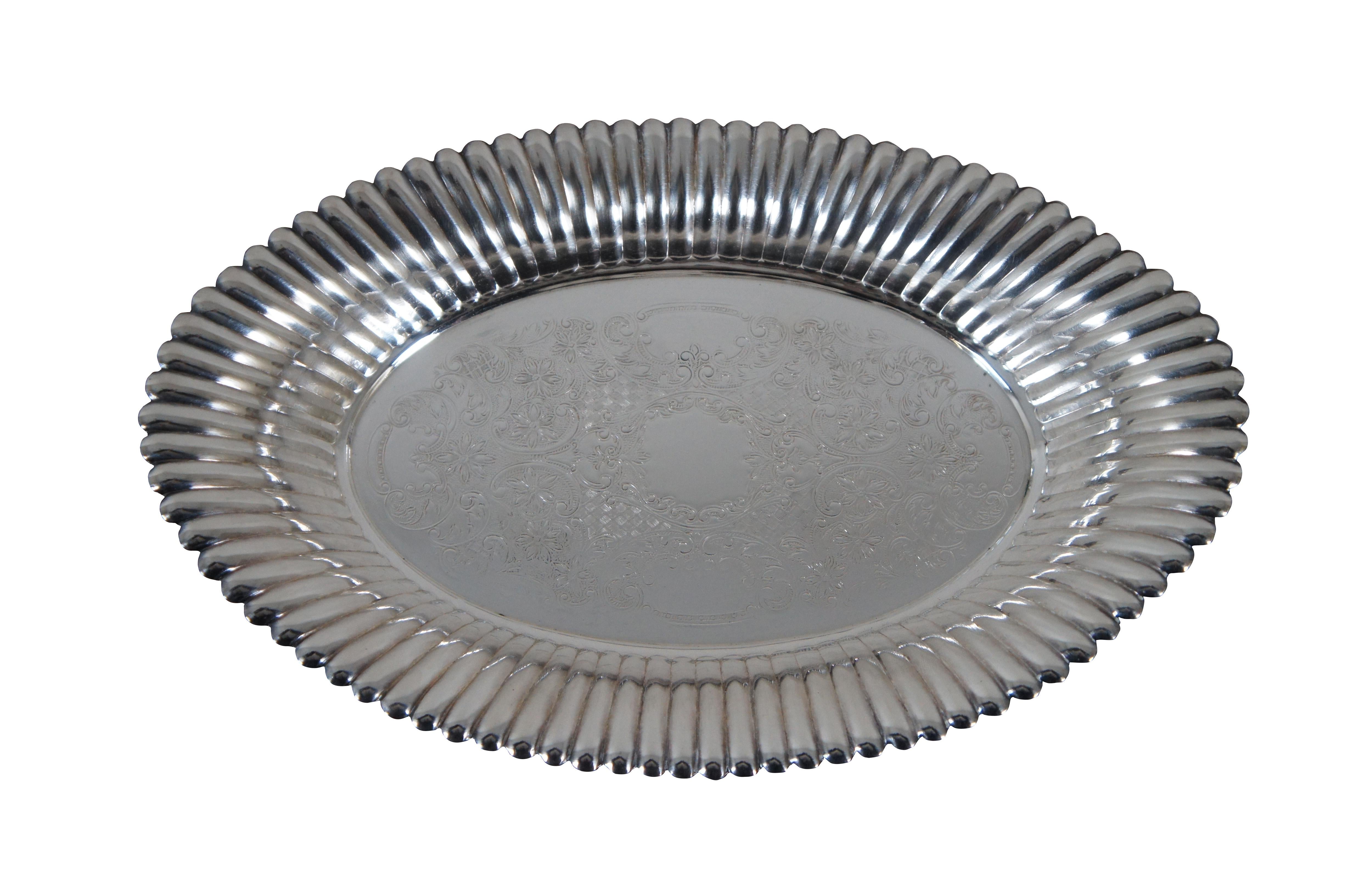 Set of 3 vintage assorted silverplate serving dishes. Wilcox Silver Plate Co / International silver Co. Beverly Manor N7062 footed bon bon / nut dish. Wallace Avalon Silverplate 1450 oval dish with fluted sides. And a small card tray / platter