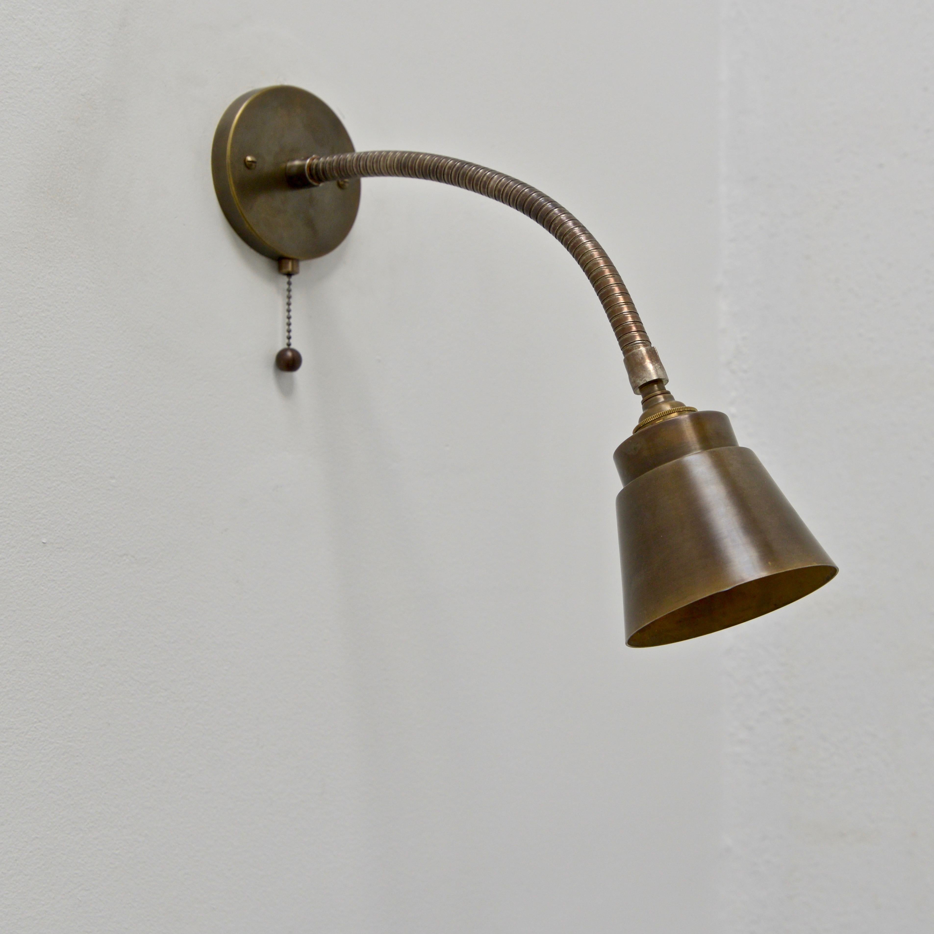 The LUgoose Sconce is part of our contemporary collection. Insprired by mid century Italian design, the gooseneck sconce is in a darkened patina brass, and steel. Single E12 based socket. Maximum wattage 75 watts. Back plate has 2 3/4” center to