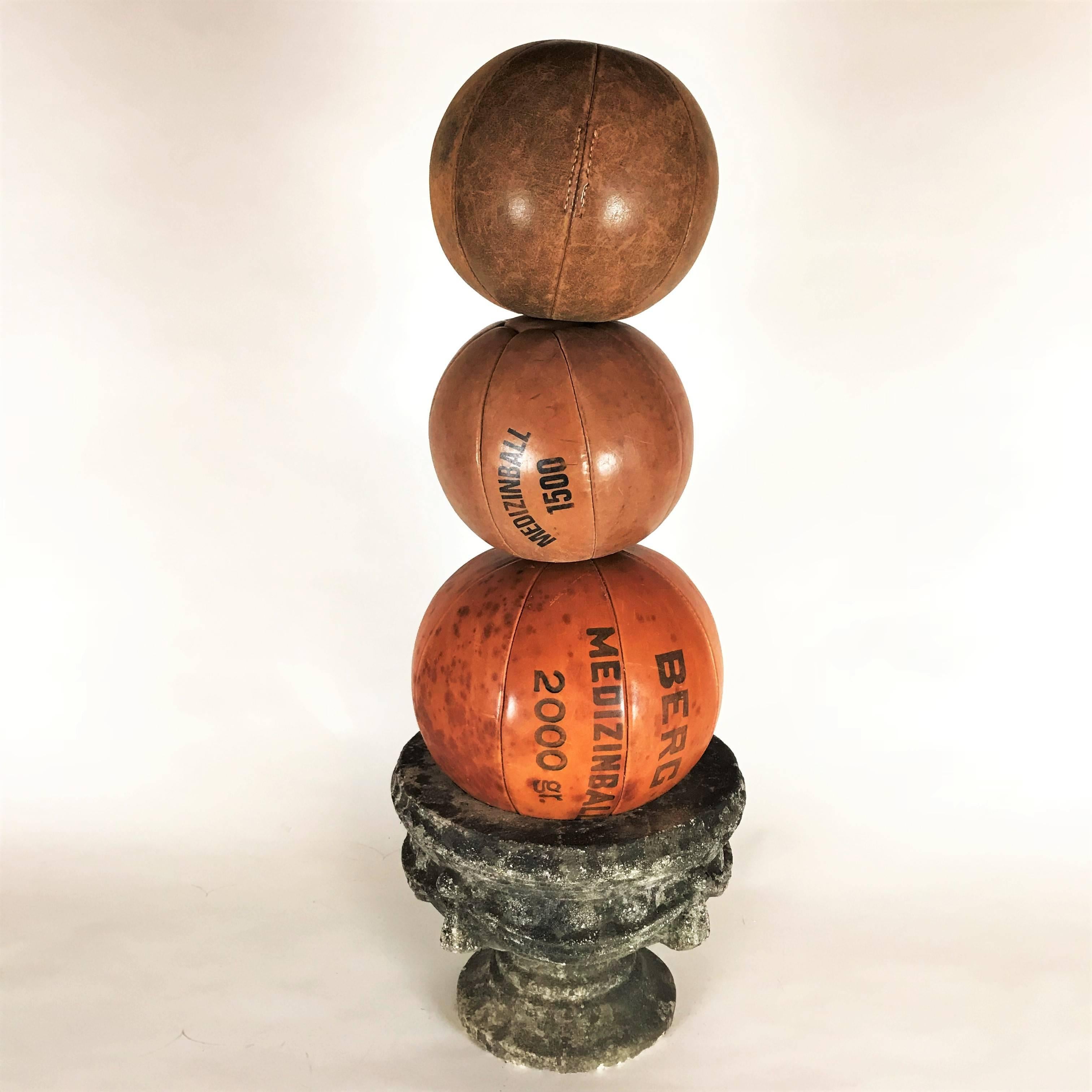 The medicine balls are part of a big collection from the 1920s-1930s, the time of the first gym enthusiasts in Germany.
The balls are handmade and filled with horse hair.
All balls are in a very good condition with nice patina and an intense