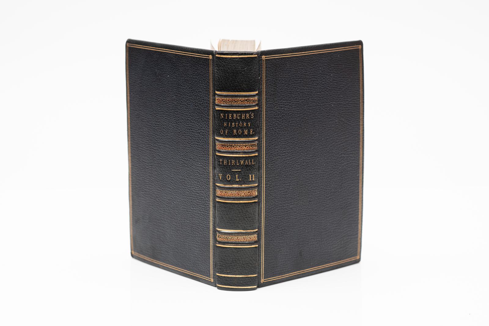 3 Vols. B.G. Niebuhr. The History of Rome. Translated by Julius Hare and Connop Thirlwall. Bound in full blue morocco, all edges gilt, raised bands, gilt panels, marble end papers with a fold-out map in volume 1. Published: London, John Wortheimer &