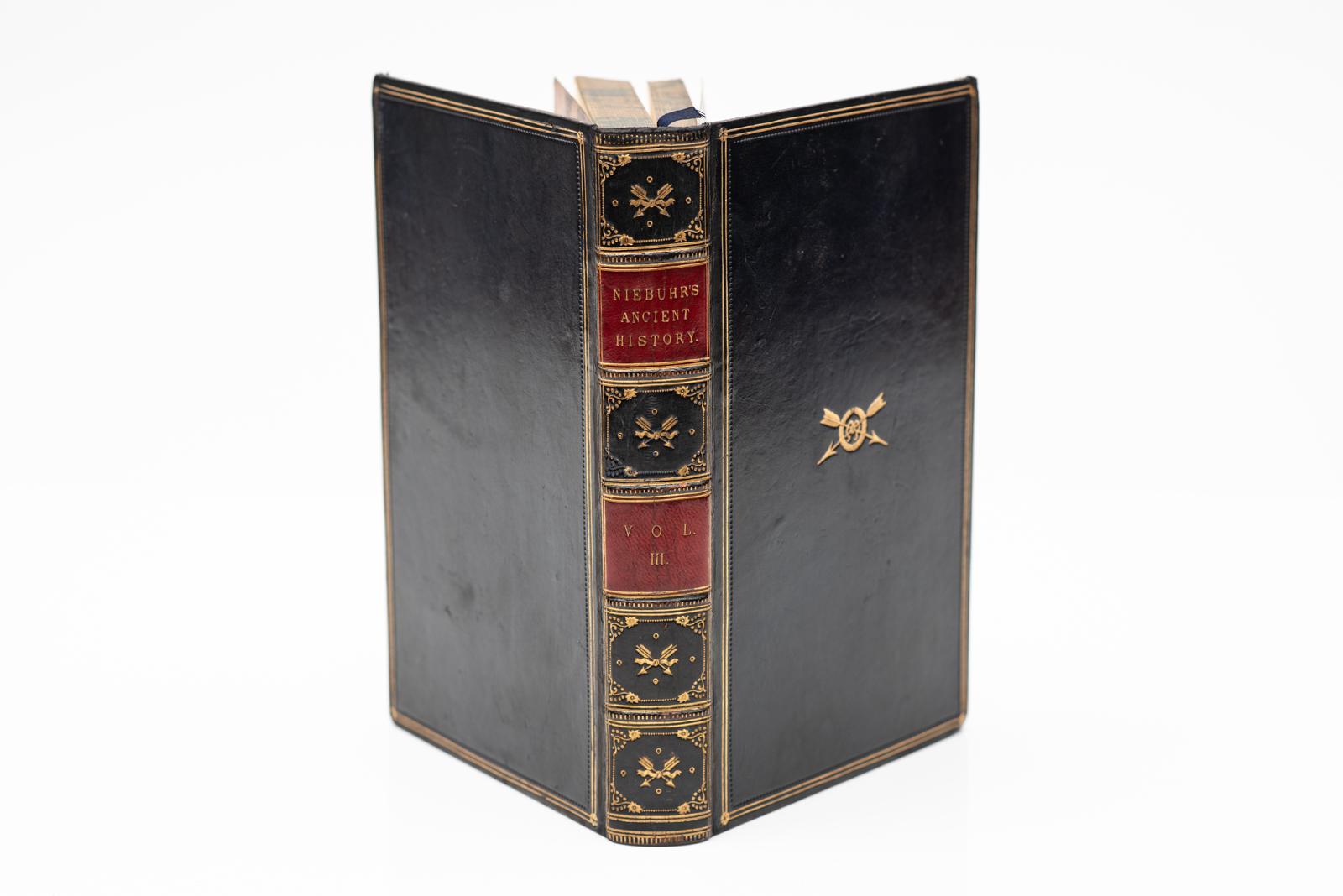 3 Volumes. B. H. Niebuhr. Lectures on Ancient
History, from the Earliest Times to the Taking of
Alexandria by Octvianus by Dr. Leonhard Schmitz.
Bound in full blue polished calf, raised bands, red labels, marbled endpapers and edges, gilt