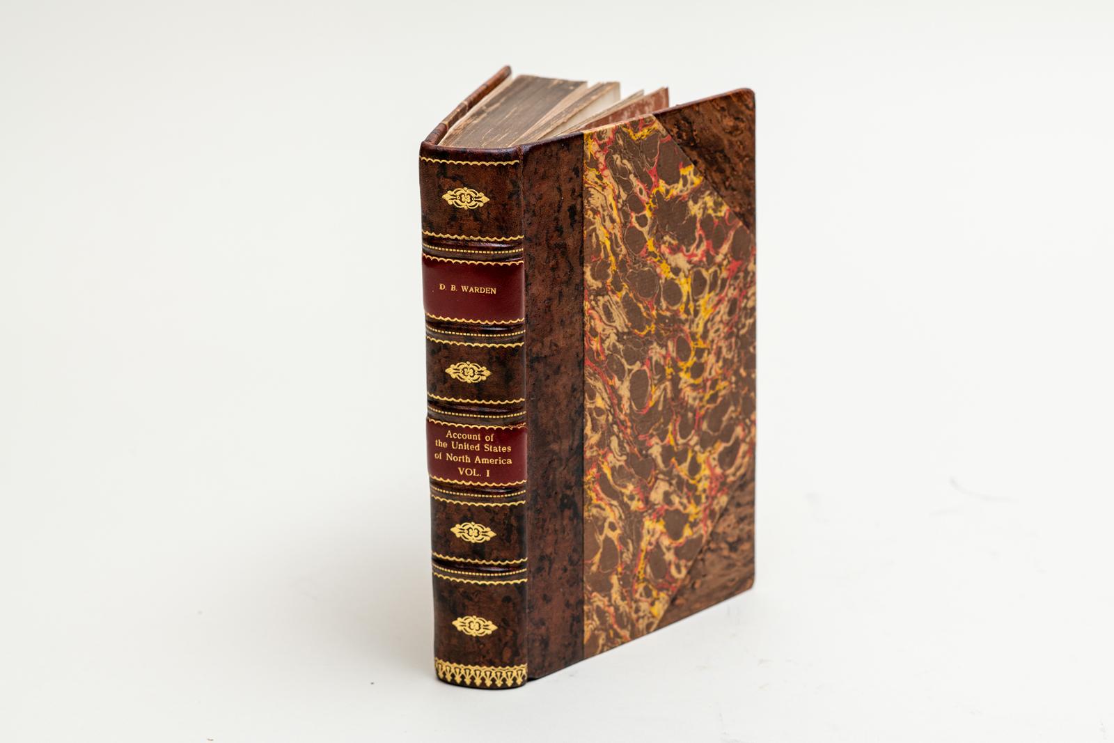 3 Volumes. D.B. Warden, Statistical, Political & Historical Account of the United States of America from the Period of their First Colonization to the Present Day. Reliure en 3/4 veau fauve et planches marbrées. Le dos à bandes surélevées présente