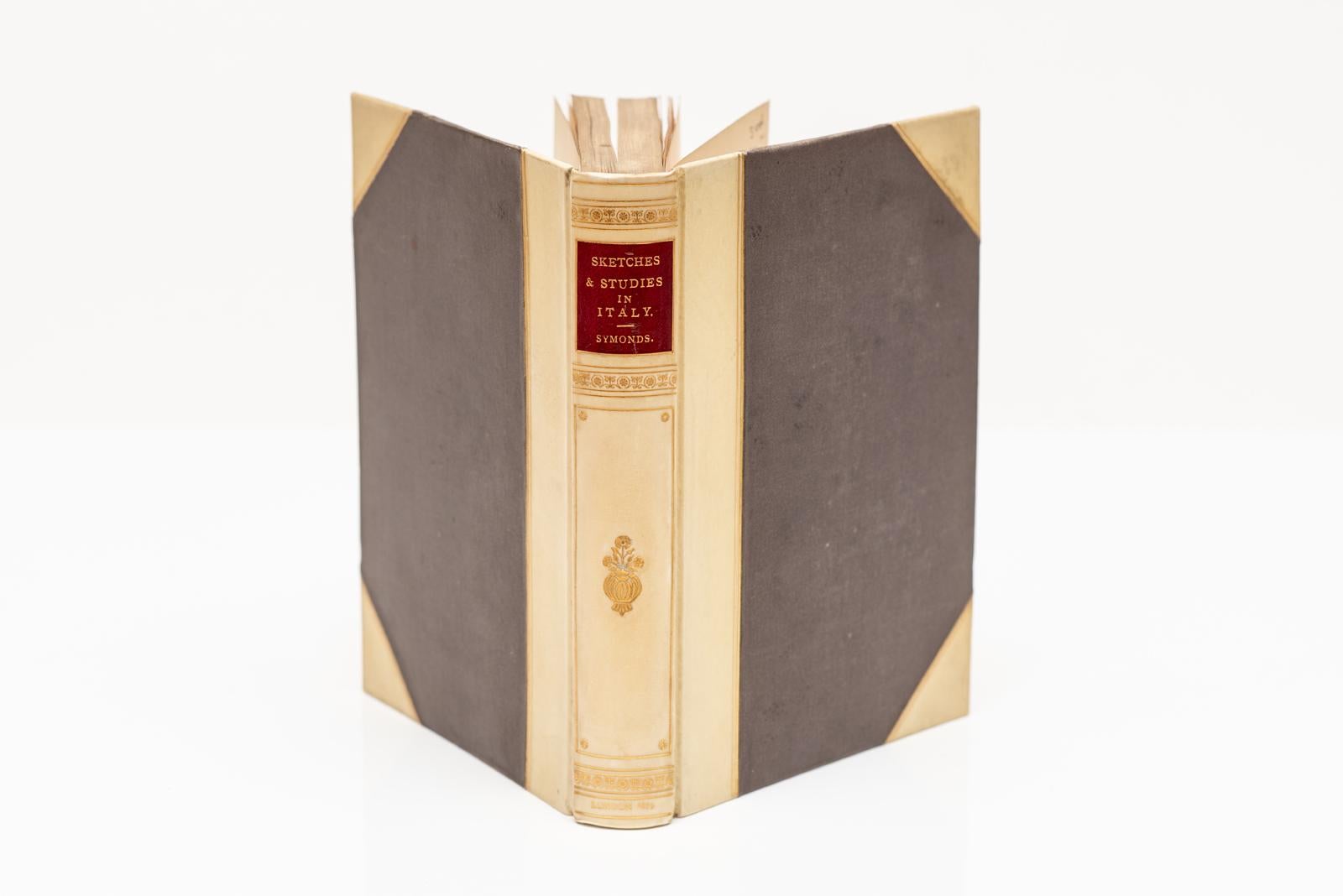 3 Volumes. John Addington Symonds, Sketches & Studies in Italy. Bound in 3/4 white calf with linen boards. Gilt-tooling and red calf label on spine. Top edges gilt. Illustrated frontispiece. London: Smith, Elder, & Co., 1879. 