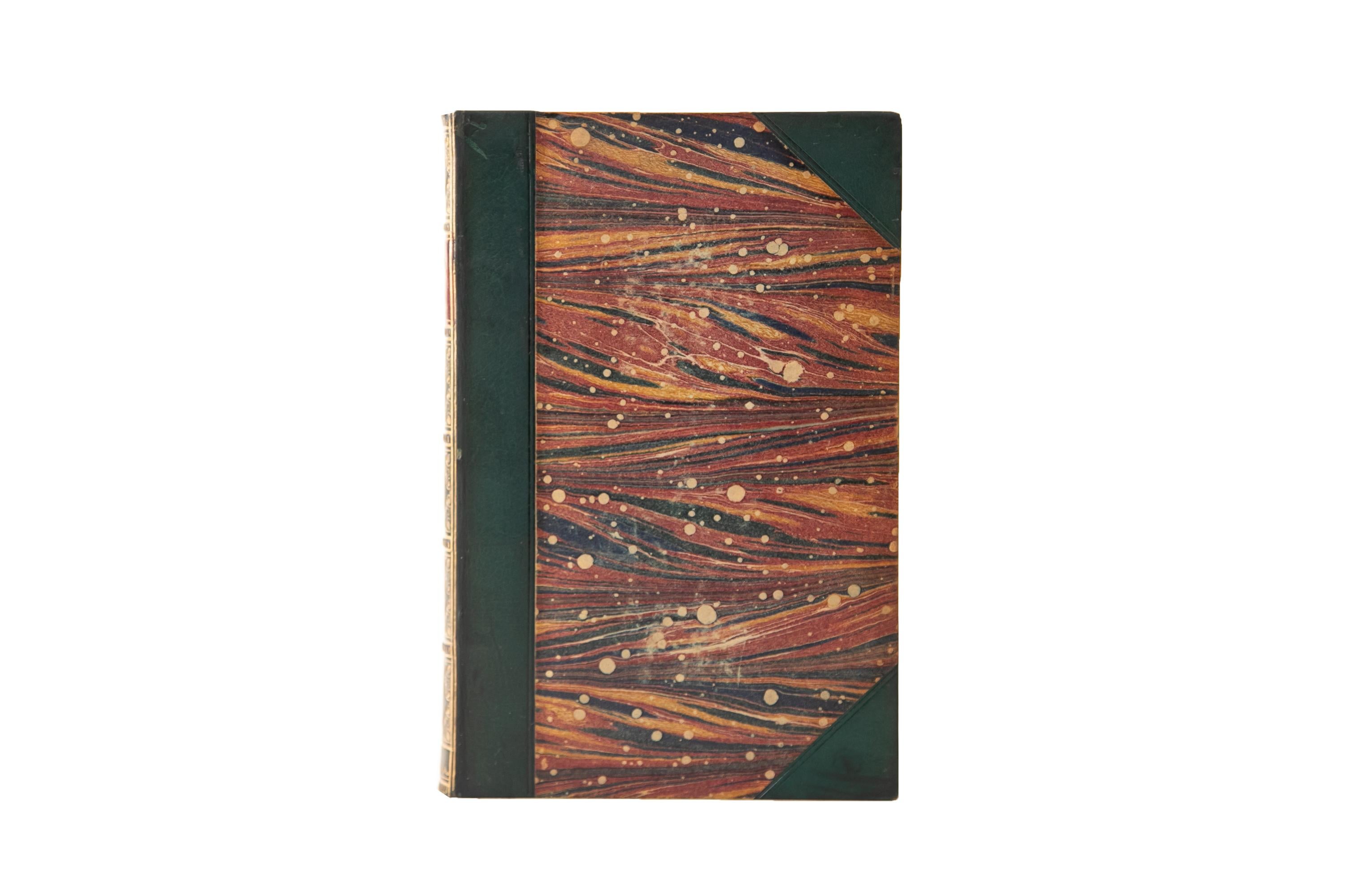 3 Volumes. Jonathan Swift, The Poetical Works. Bound in 3/4 green calf and marbled boards. The spines display raised bands, bordering, floral panel detailing, and label lettering, all gilt-tooled with the labels in red calf. All of the edges are