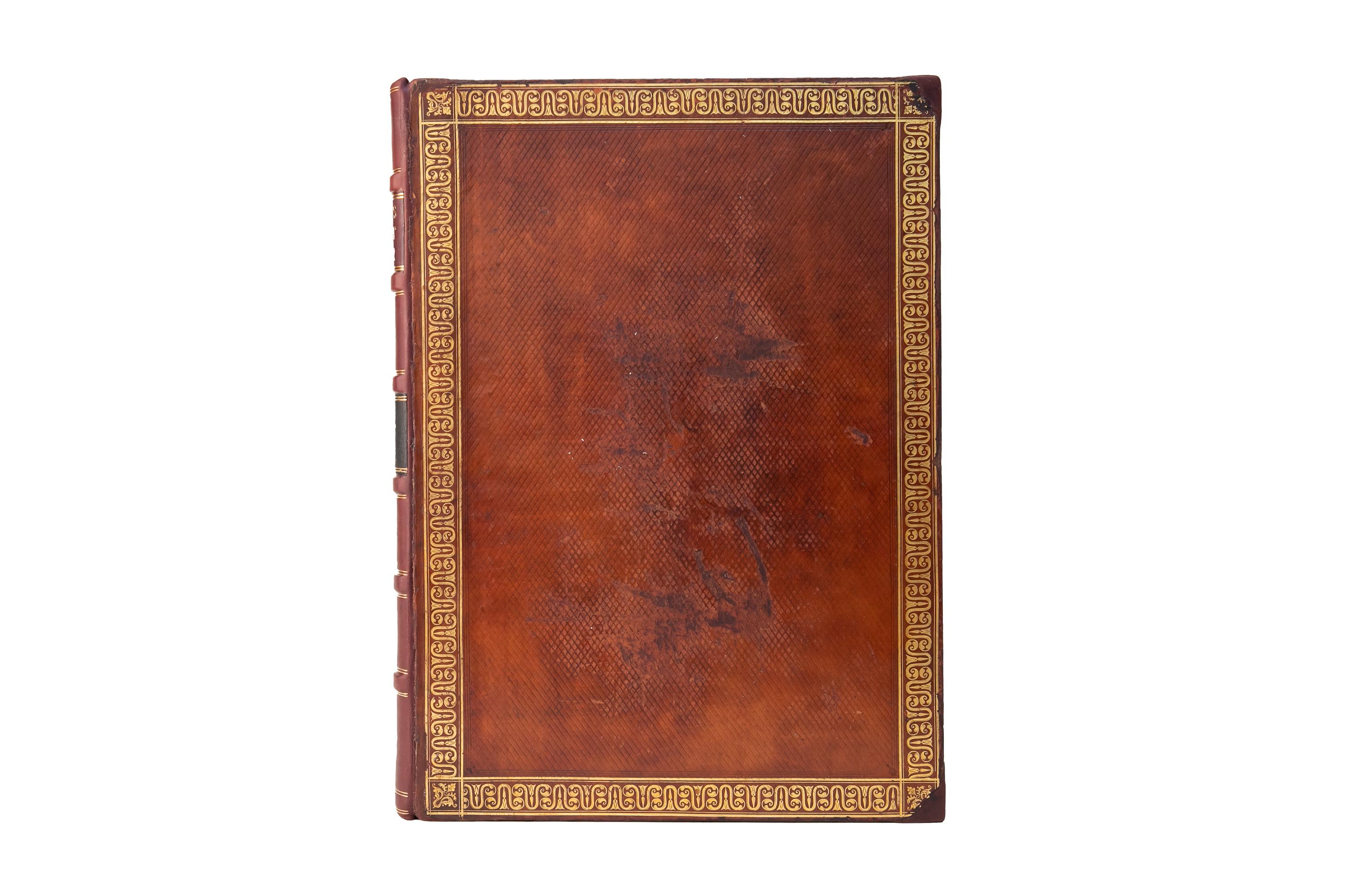 3 Volumes. Samuel Rush Meyrick, Ancient Armour. Bound in full tan calf with the covers displaying gilt-tooled borders and an open-tooled cross-hatching pattern. Respines in purple morocco with gilt-tooled detailing and green morocco labels. All