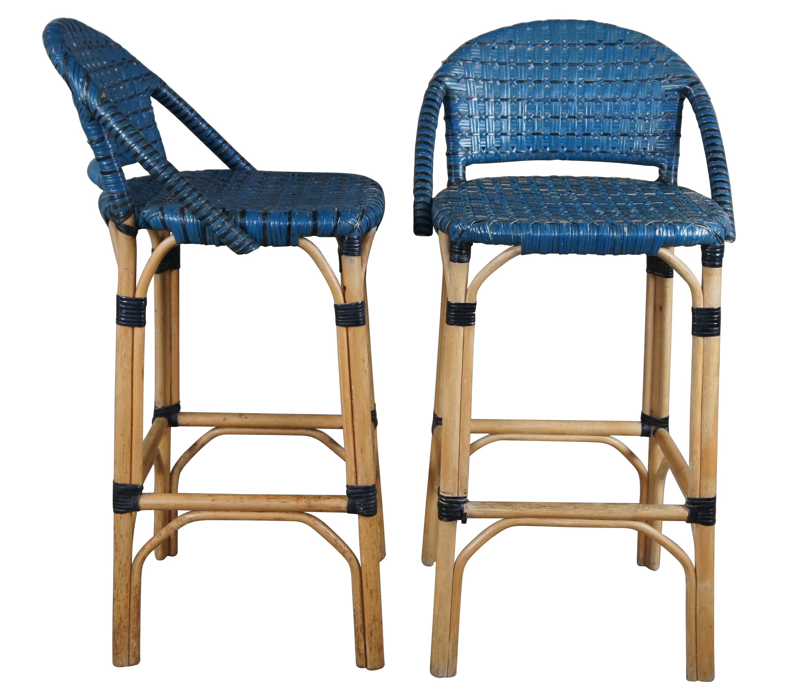 3 vintage Bohemian counter height stools after Maison Gatti, circa 1970s. Made from Bamboo and blue woven rattan. Feature a sleek bentwood design with black accents

Dimensions

Measures : 20