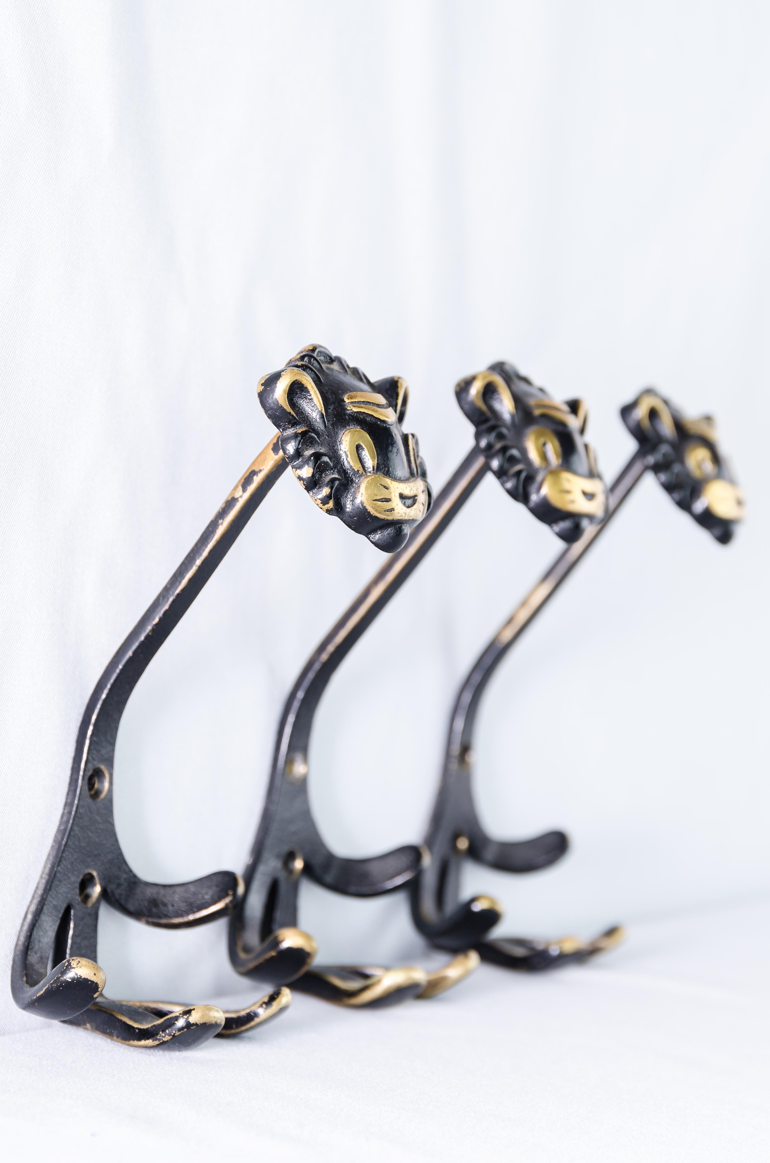 Blackened 3 Walter Bosse Brass Wall Hooks of a Lion Austria, 1950s For Sale