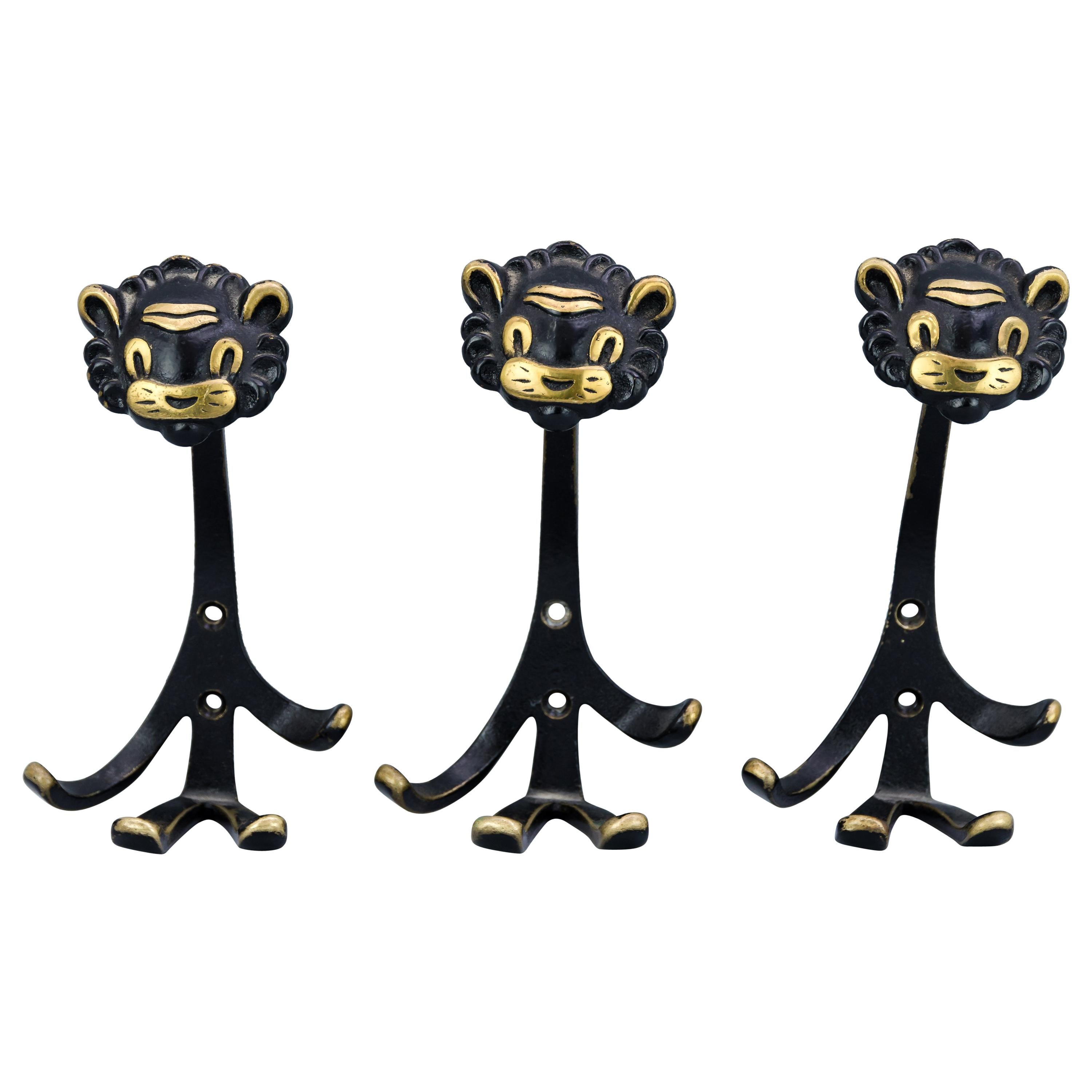 3 Walter Bosse Brass Wall Hooks of a Lion Austria, 1950s