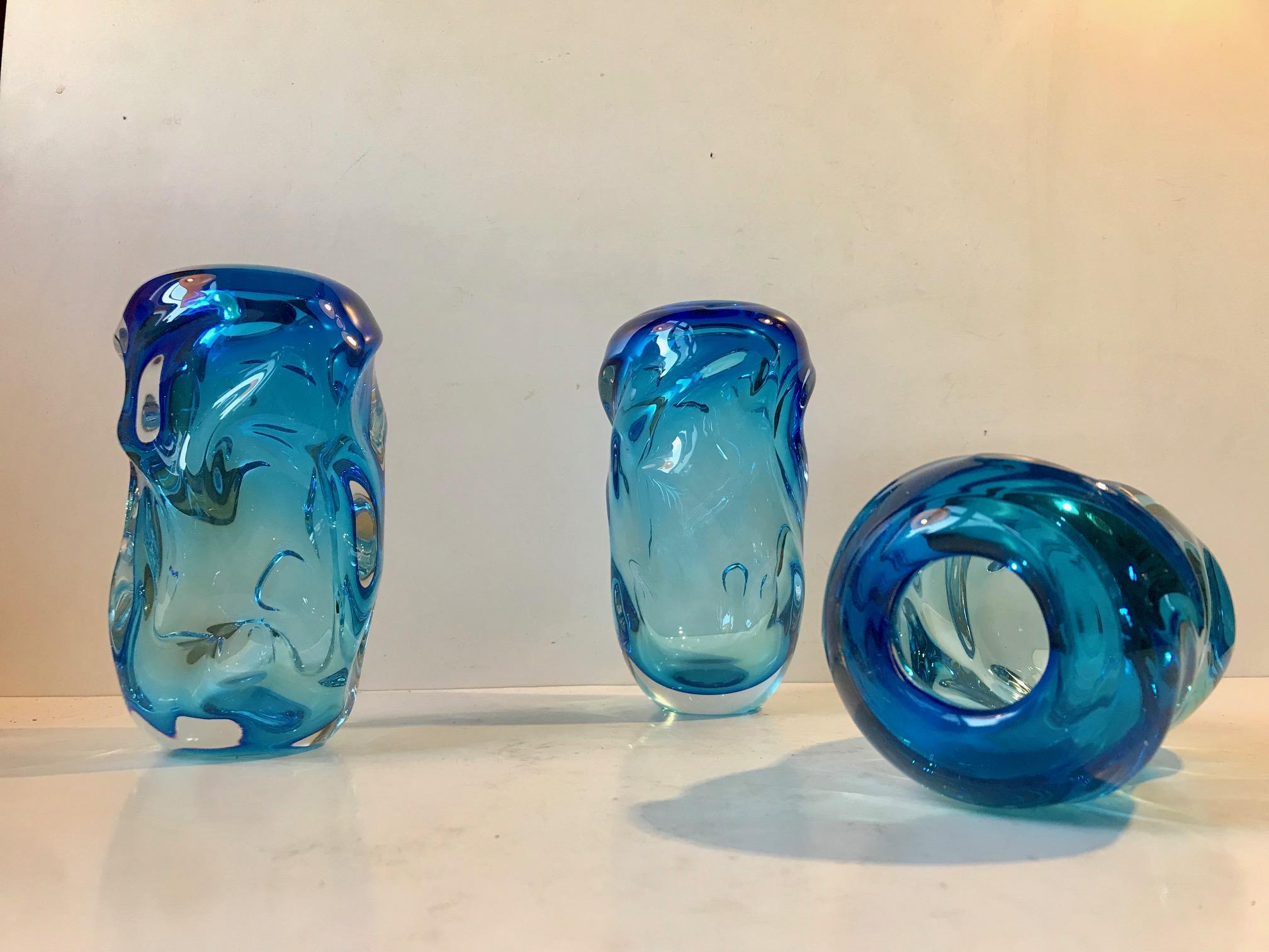 3 similar yet different art glass vases. Executed with freeform technique by Bohemian Glassmaker Jan Beranek in his studio Skrdlovice in the Czech Republic during the late 1960s.