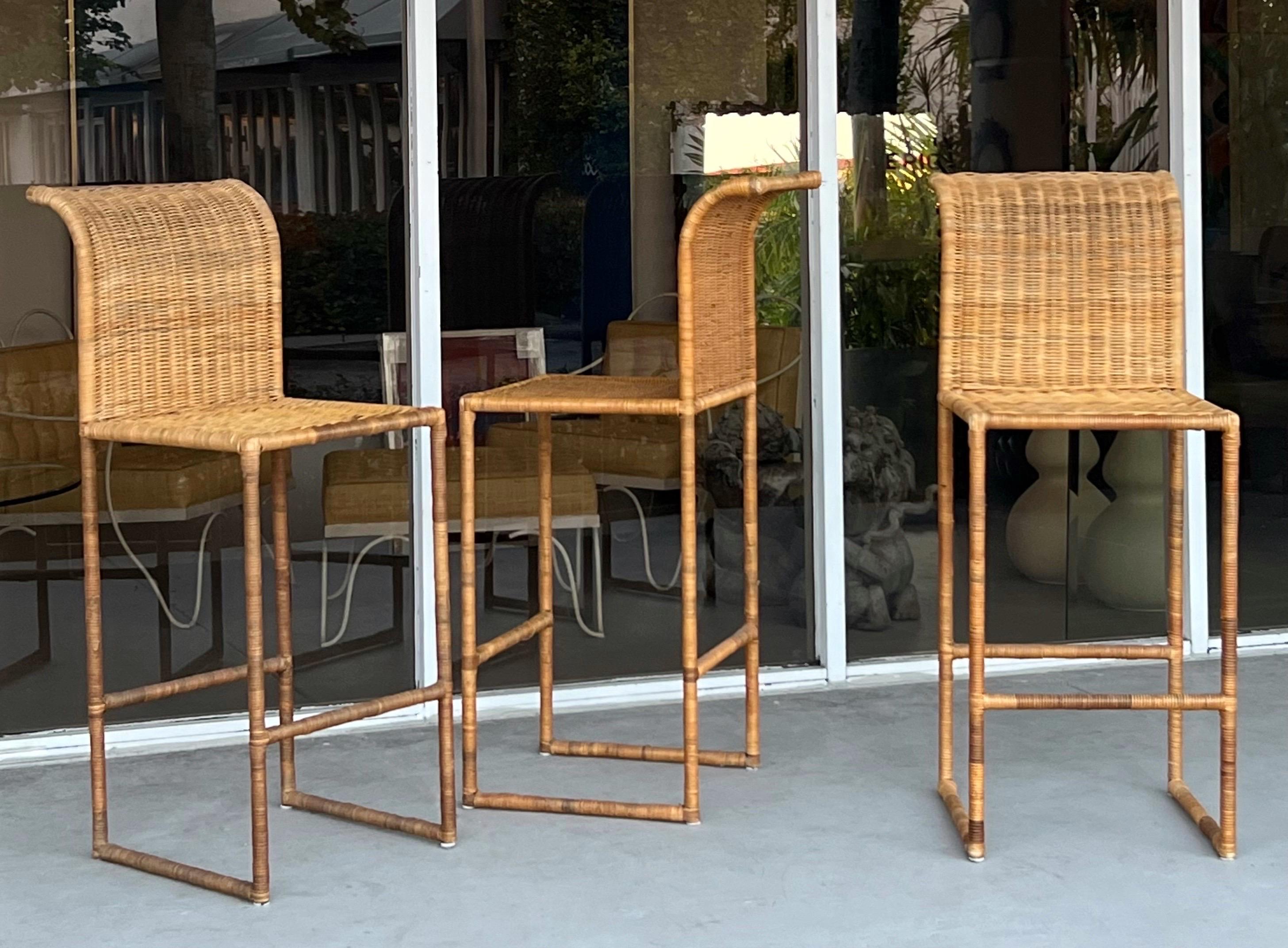 A set of 3 wicker barstools. Clean modern design. 
