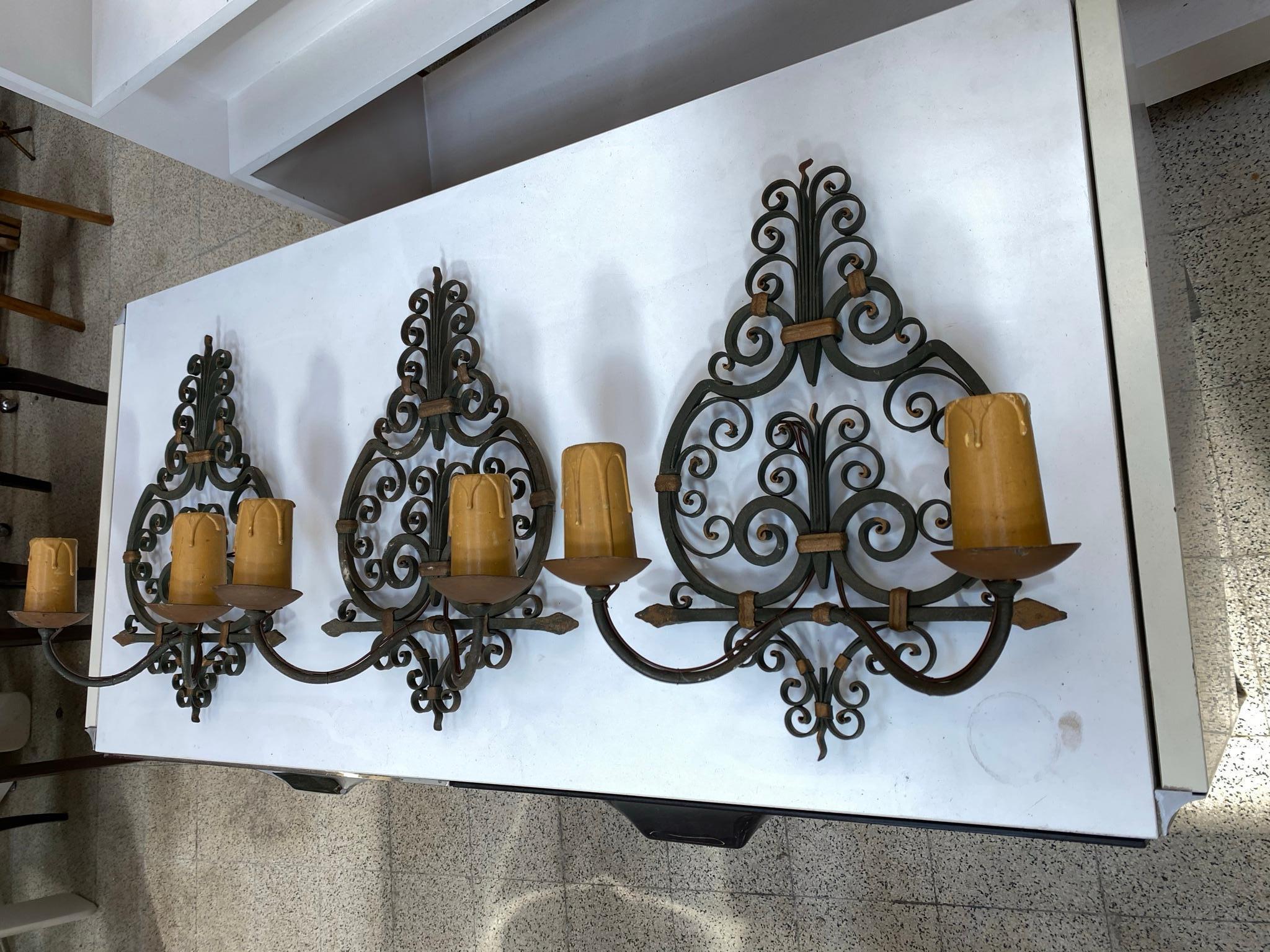 3 wrought iron. Art Deco wall sconces, French, 1940s.