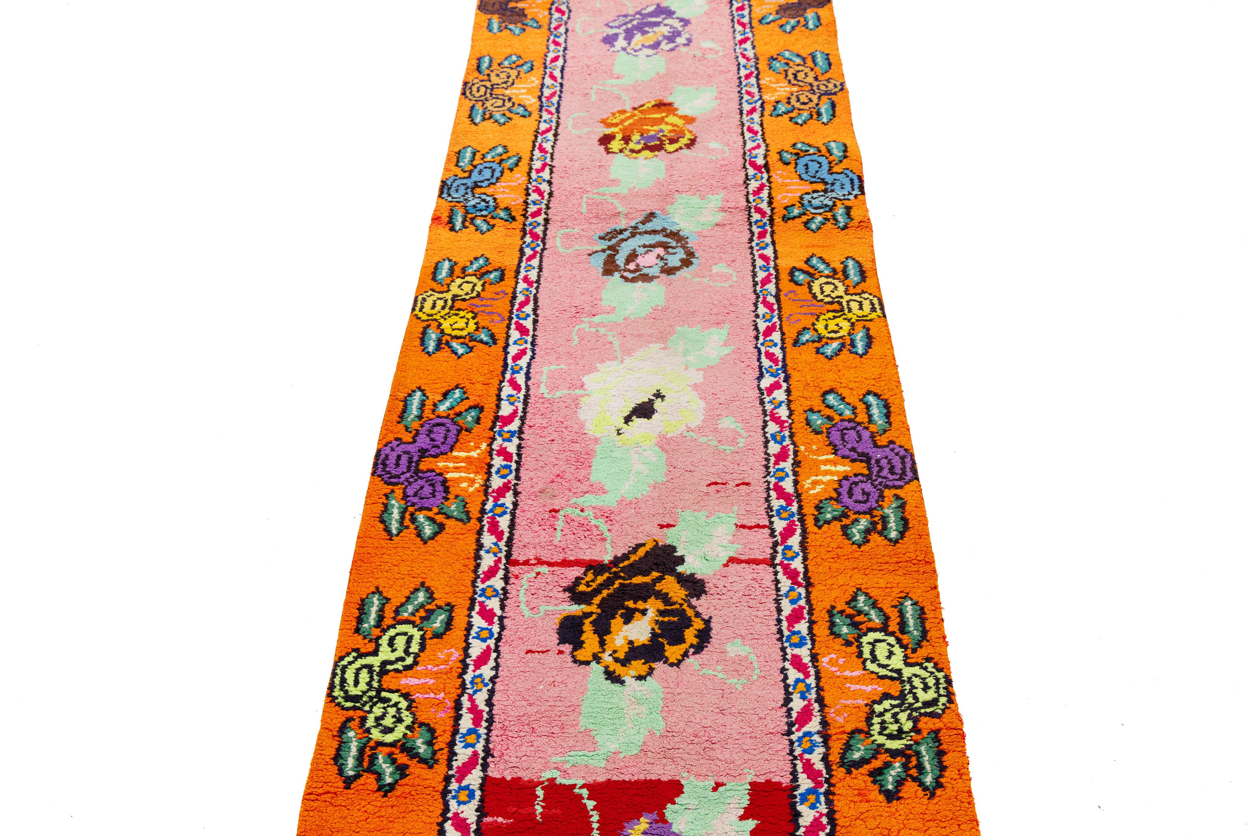 20th Century 3 x 13 Handmade Vintage Turkish Wool Runner with Vibrant Floral Motifs For Sale