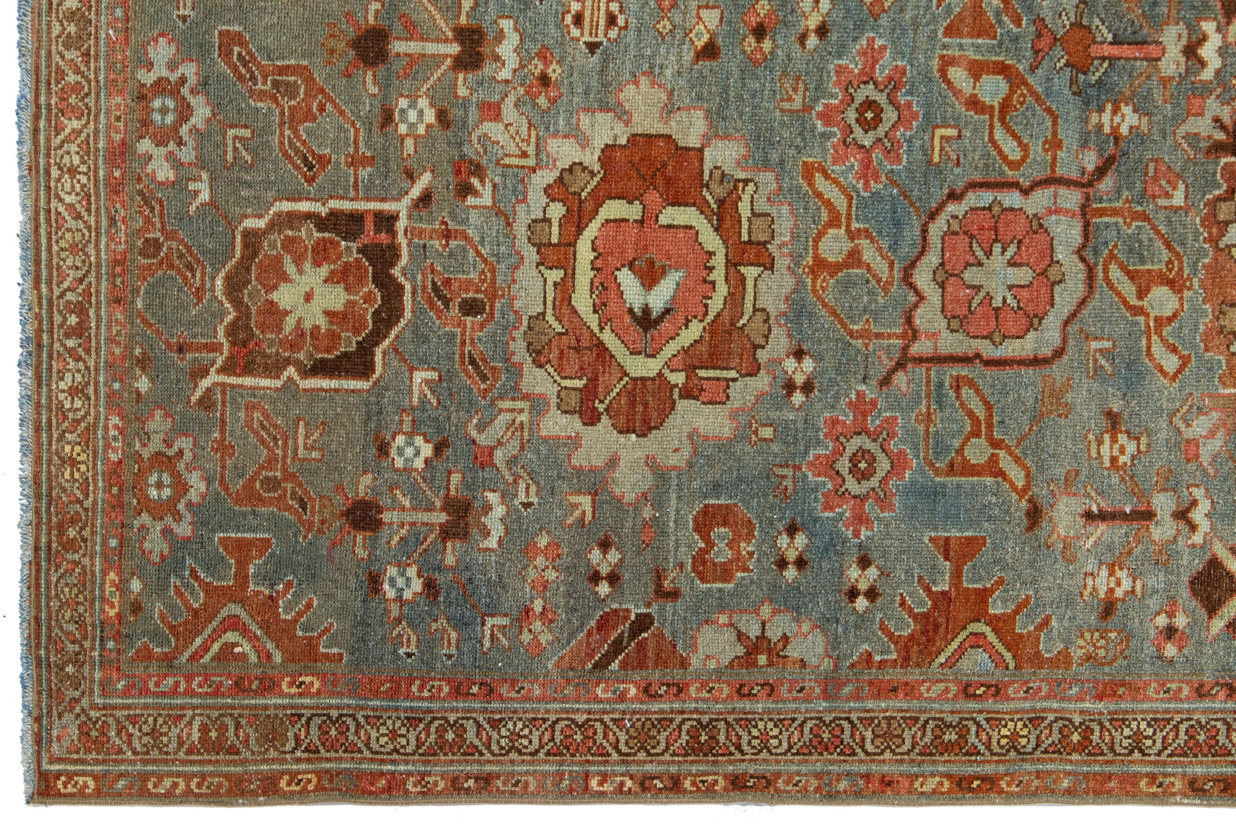 Hand-Knotted 3 x 14 Antique Handmade Heriz Wool Runner In Blue With Floral Design For Sale