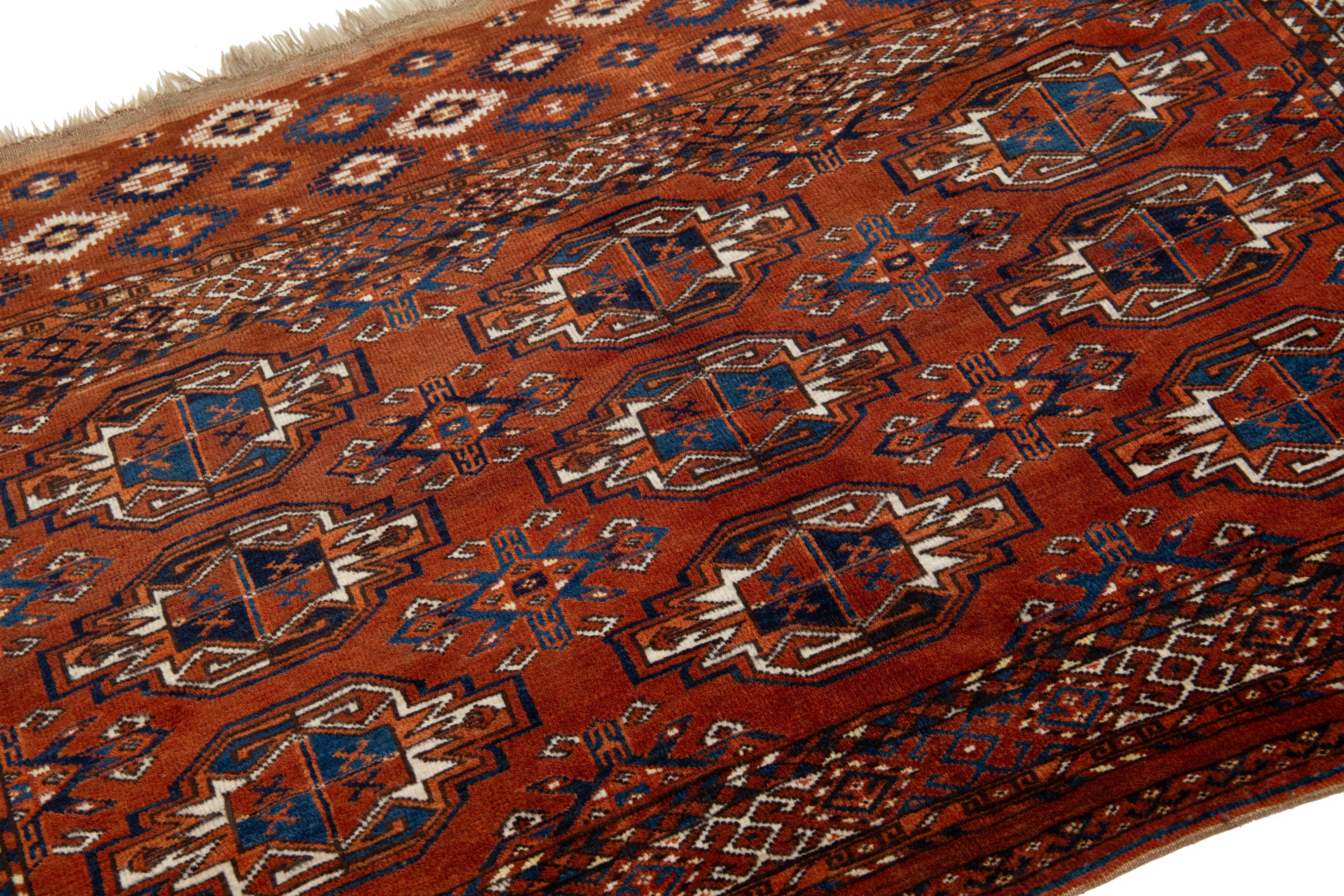 Hand-Knotted 3 x 5 Antique Persian Turkmen Wool Rug In Rust Color With Allover Gul Pattern For Sale