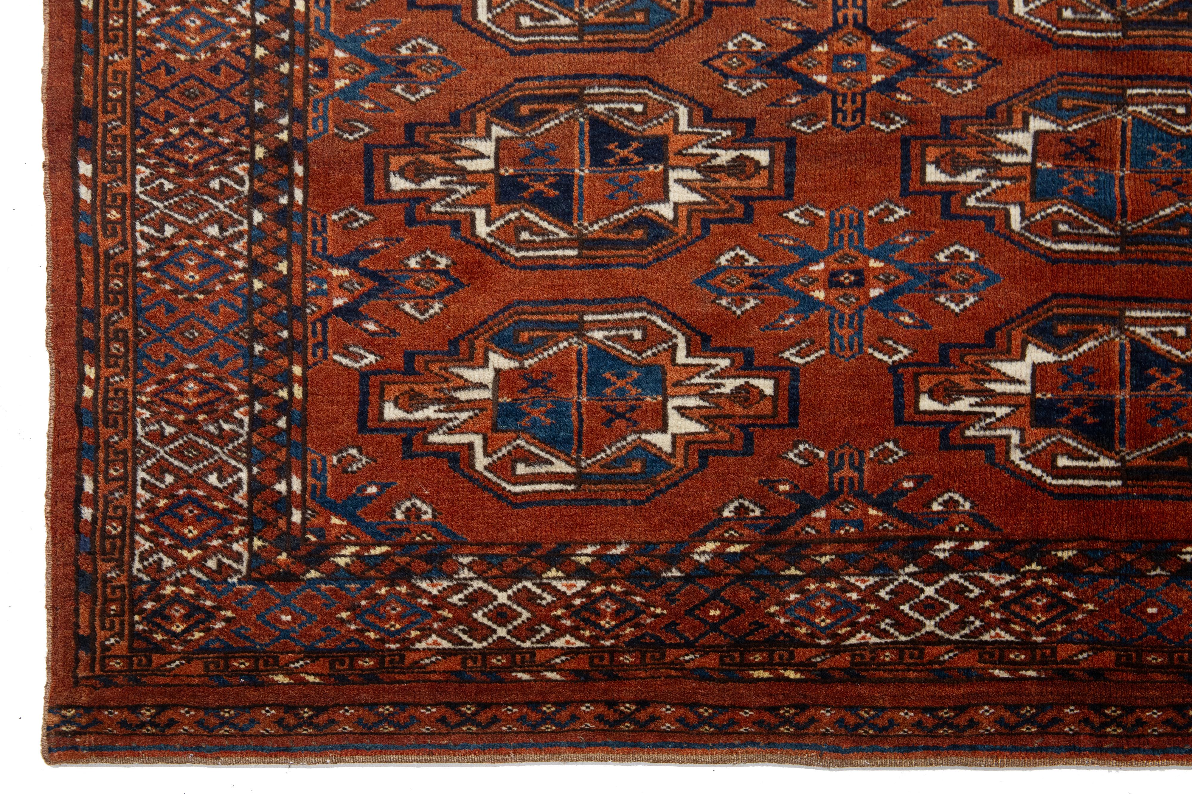 20th Century 3 x 5 Antique Persian Turkmen Wool Rug In Rust Color With Allover Gul Pattern For Sale