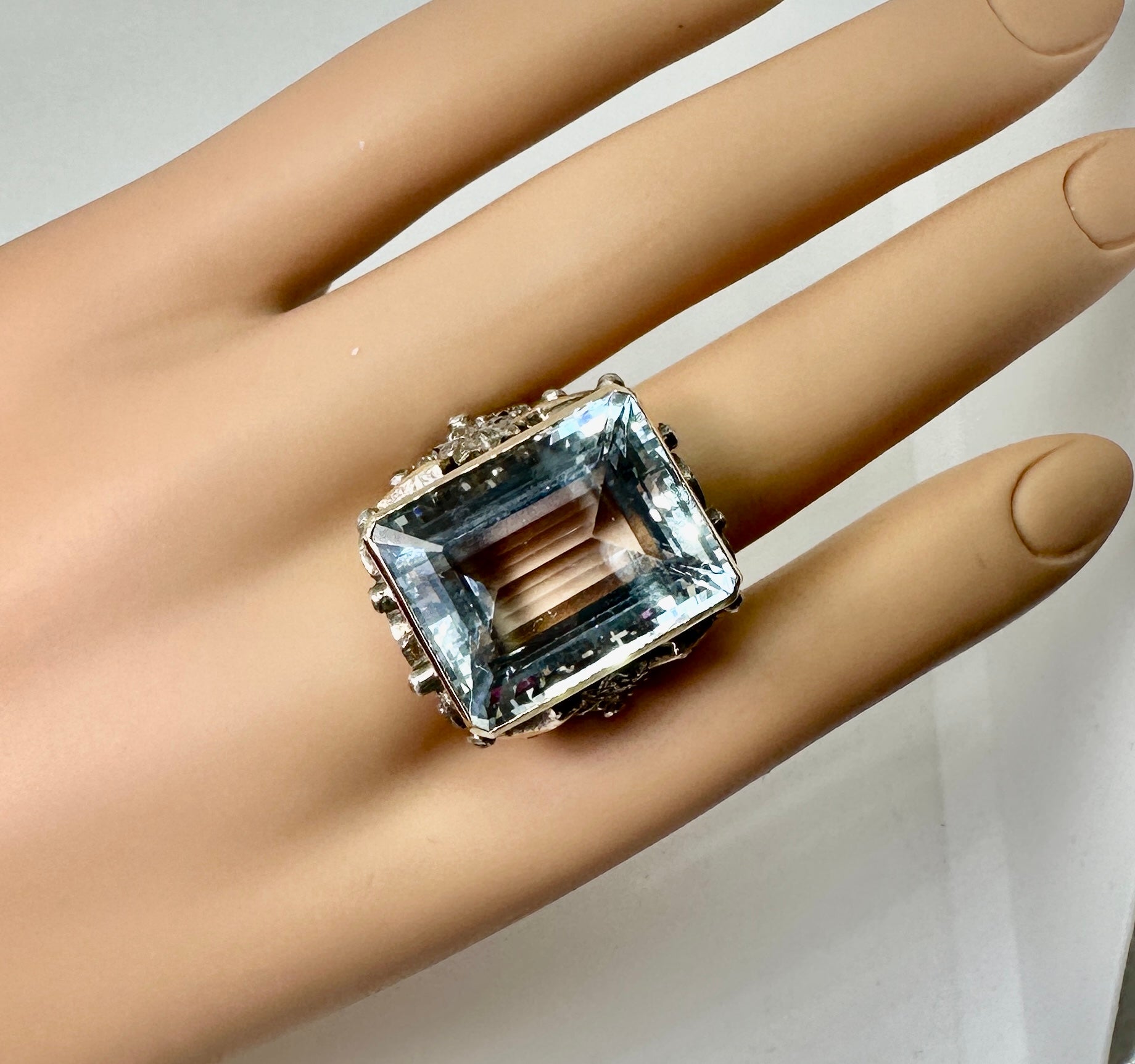 We are so delighted to have this extraordinary 30 Carat antique natural Aquamarine Rose Cut Diamond and Ruby Ring.  The magnificent emerald cut aquamarine is 21mm long, 17mm wide and 13mm deep and is approximately 30 Carats.  The cut is exquisite. 
