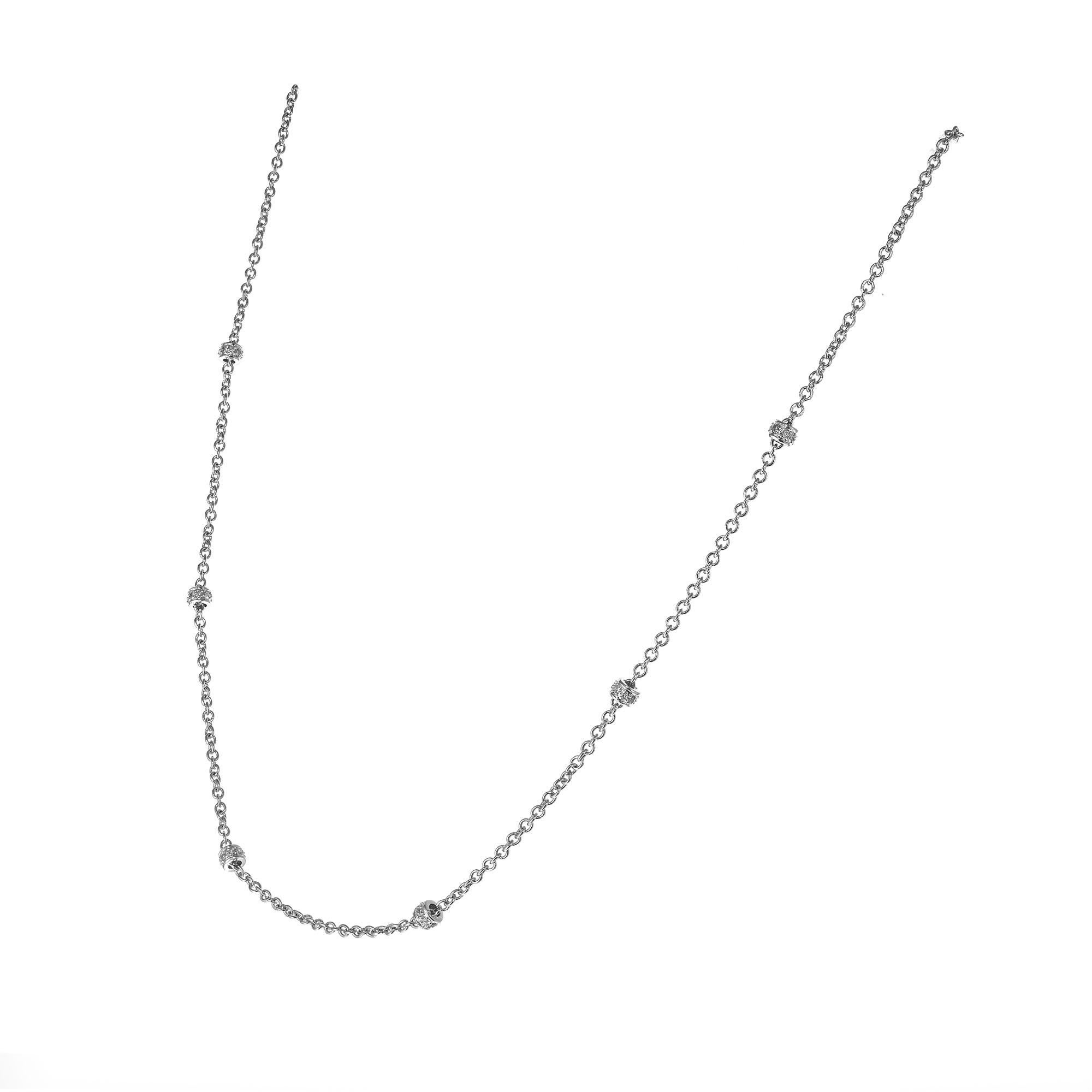 Diamond by the Yard necklace with six diamond rondels at total of .30 carat diamonds in a 14k white gold. Lobster catch. 16 inches in length. 

30 round single cut diamonds, H-I SI approx. .30cts
14k white gold 
Stamped: 585
3.7 grams
Total length: