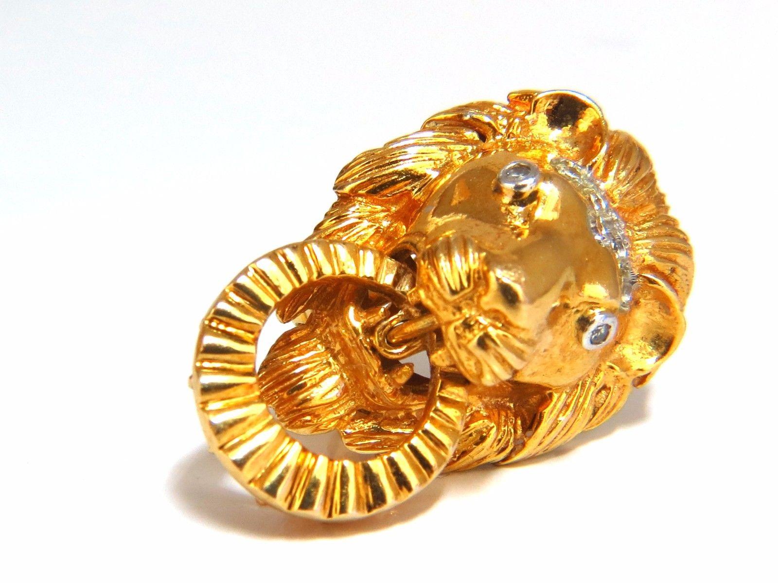 Vintage Lion Earrings

.30ct. Round cut natural diamonds

H-color

Vs-2 clarity.

22.2 grams.

18kt yellow gold

Overall: 1.1 X .76 inch

Depth: .53 inch

Ring within mouth is movable.

$4000 Appraisal Certificate to accompany

