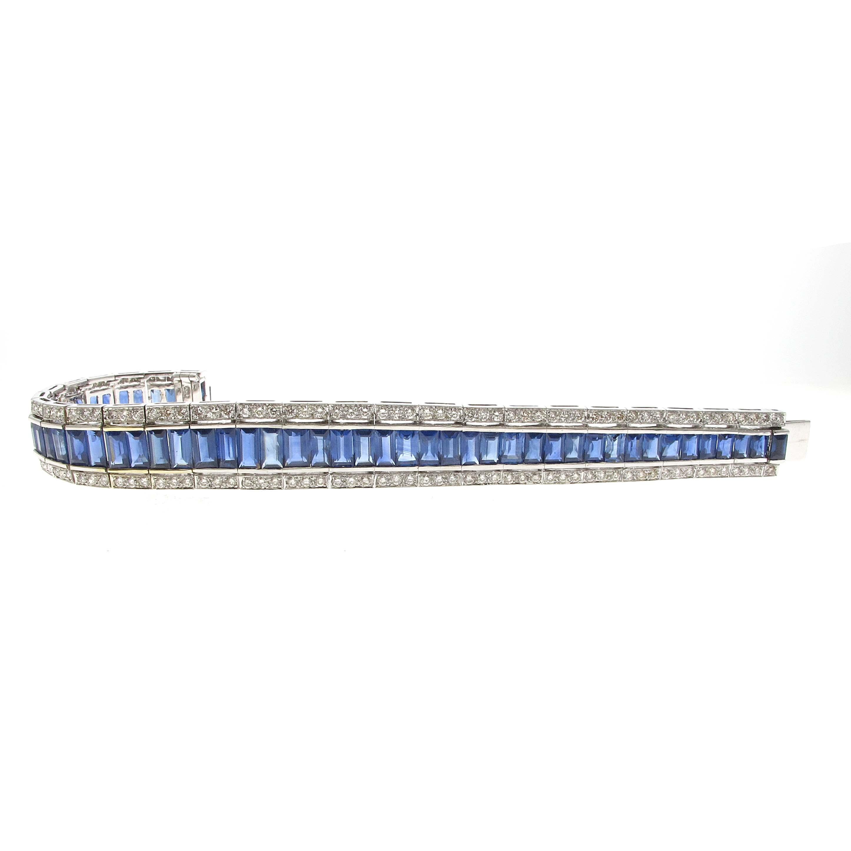 This bracelet is truly fantastic. Approximately 30 carats of french cut blue sapphires set between approximately 4 carats of fine white diamonds. This bracelet is set in 18kt white gold and the perfect look to compliment any outfit. The bracelet