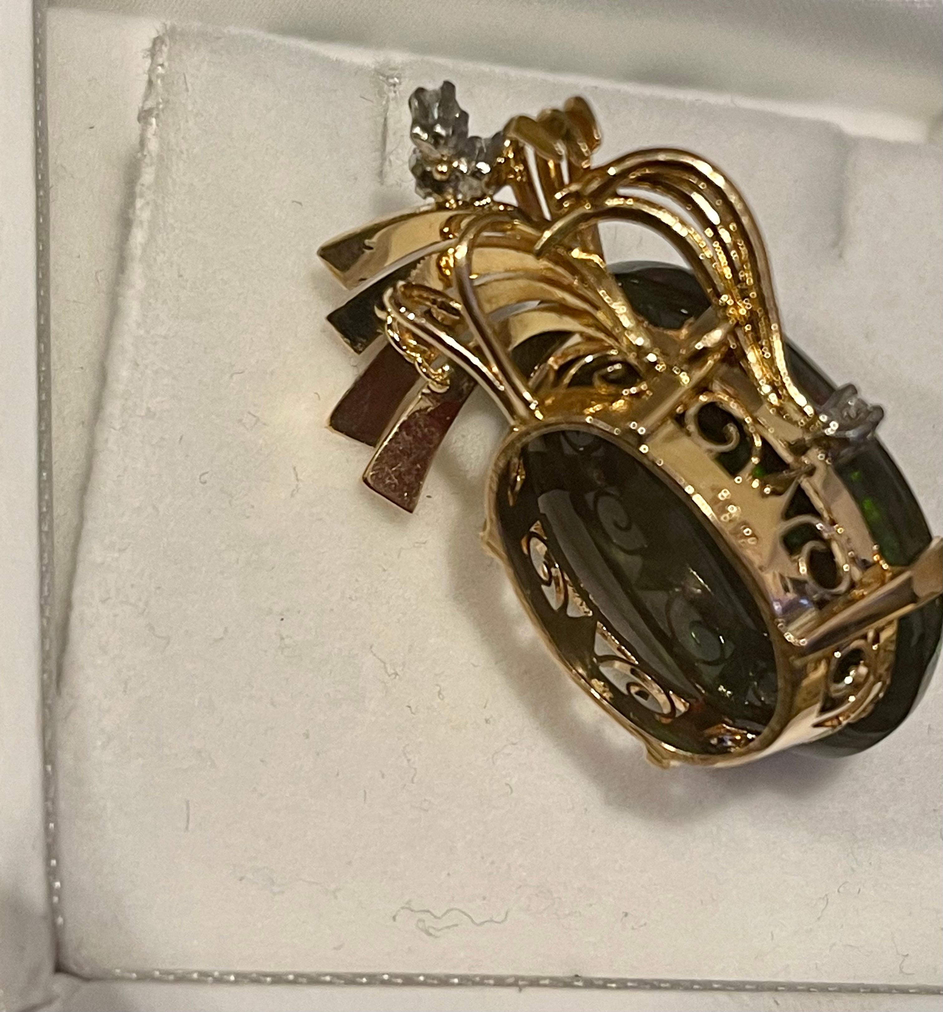 Oval Cut 30 Carat Oval Ethiopian Black Opal Pendant/Necklace 18 Karat + 18 Kt Gold Chain For Sale