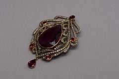 30 Carat Pear Shaped Tourmaline with Diamonds, Garnets, 15kt Gold/Silver Brooch