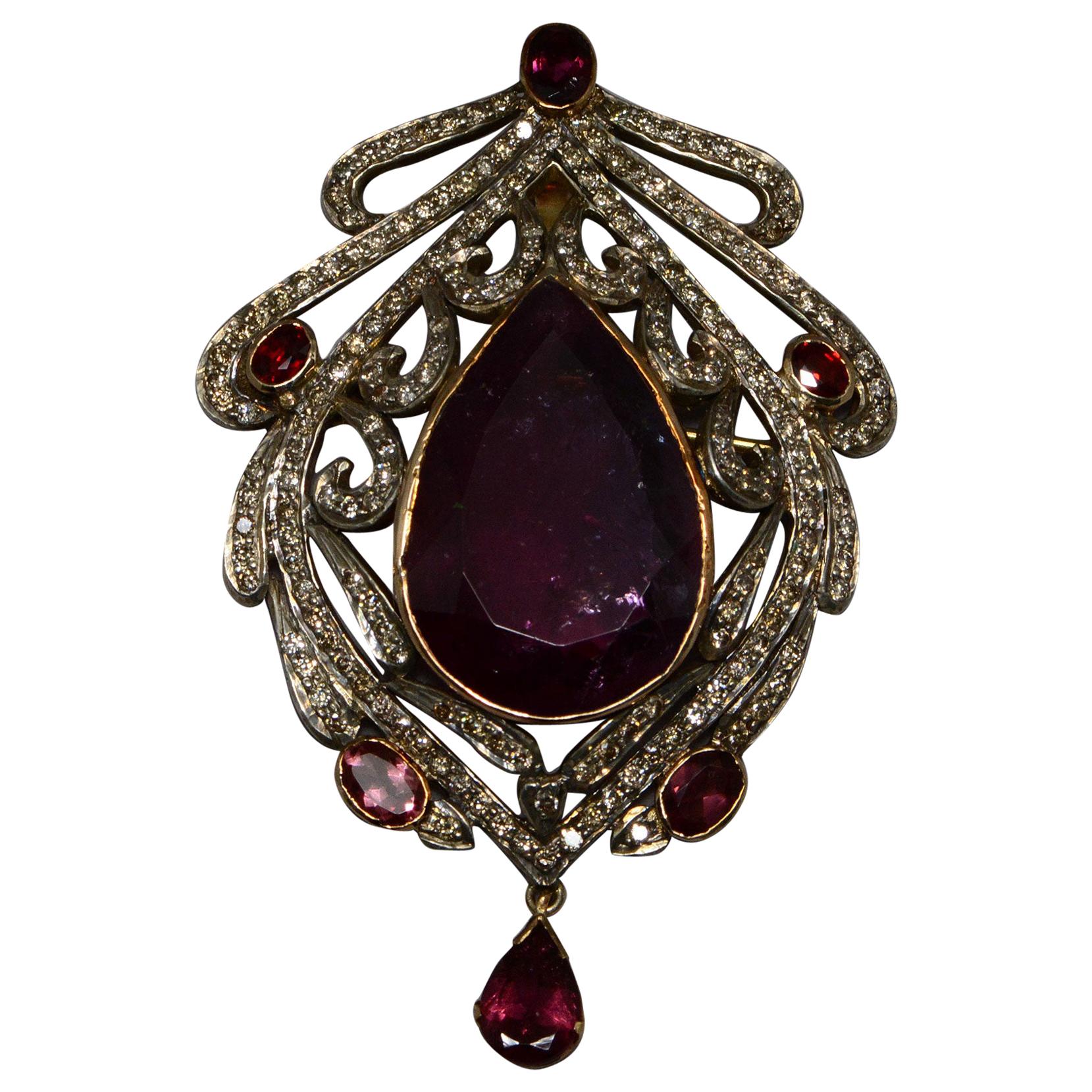 30 Carat Pear Shaped Tourmaline with Diamonds, Garnets, 15kt Gold/Silver Brooch For Sale