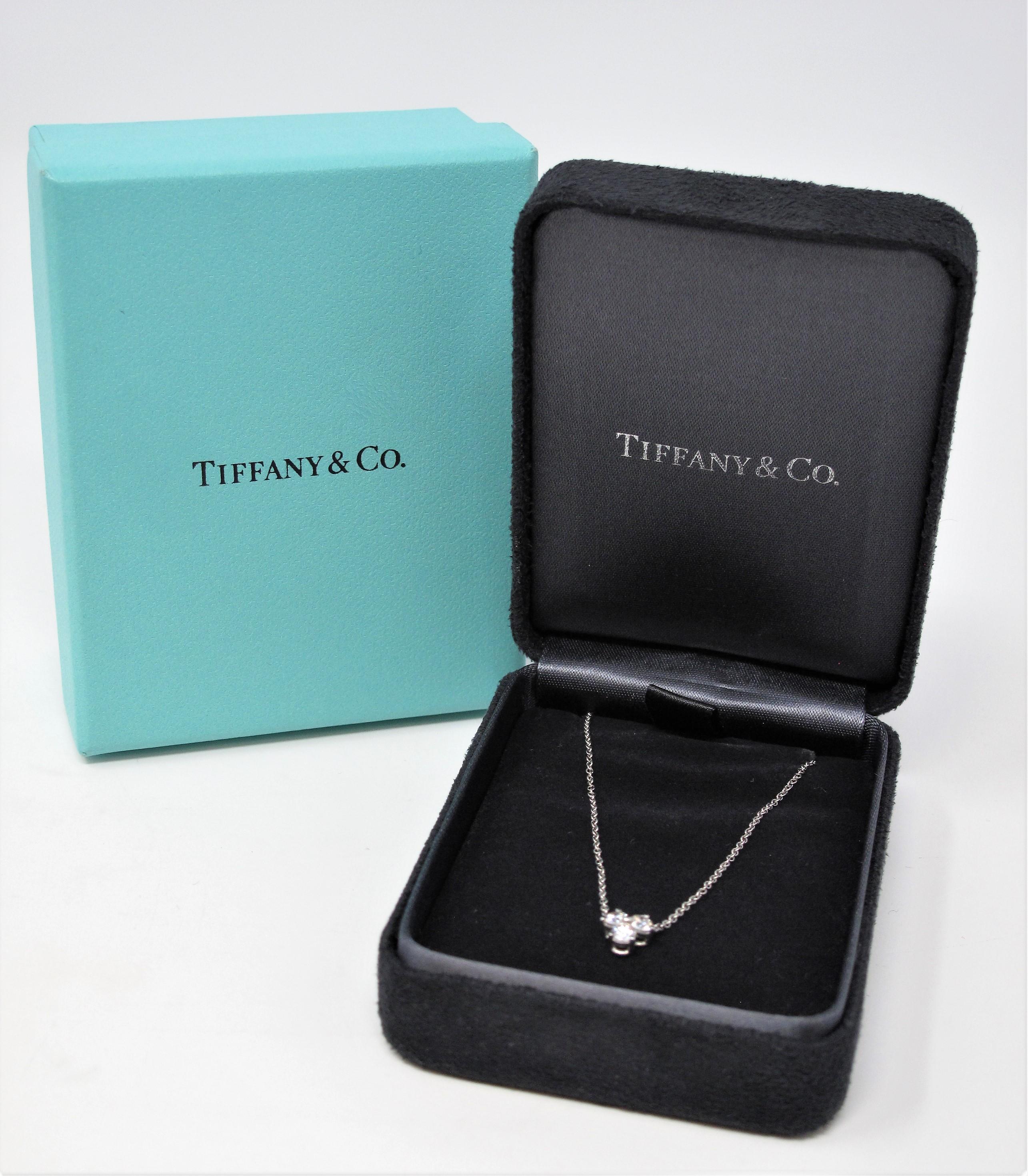 The diamond Aria pendant necklace from Tiffany & Co. is stunningly simple, yet impressively elegant. This is one of those necklaces that you will never want to take off!  Featuring a delicate platinum chain and an icy trio of natural round diamonds,