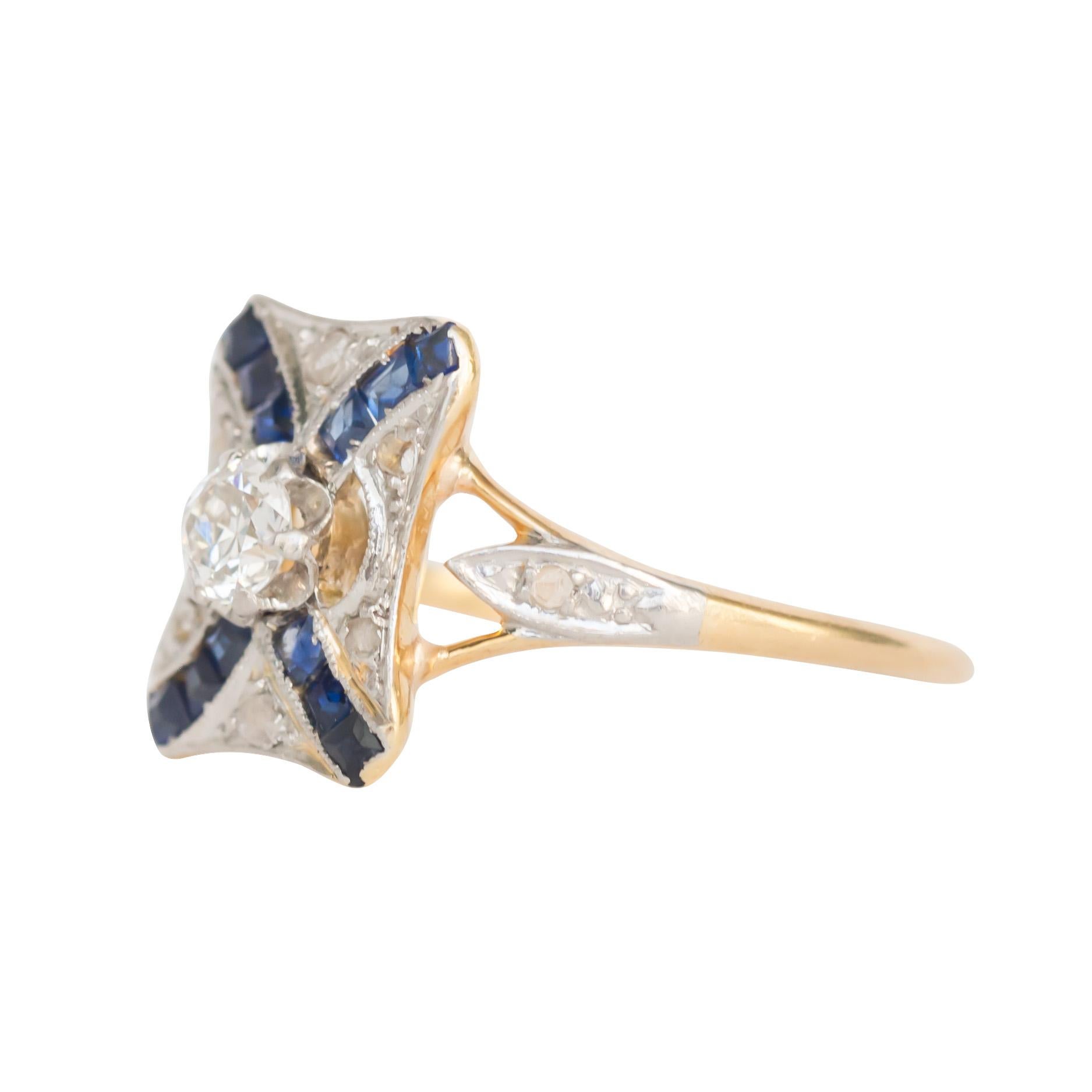 Ring Size: 5.5
Metal Type: 14 karat Yellow Gold & Platinum  [Hallmarked, and Tested]
Weight:  2.2 grams

Diamond Details:
Weight: .30 carat, total weight
Cut: Old European Brilliant
Color: G
Clarity: VS

Sapphire  Details:
Weight: .20 carat, total